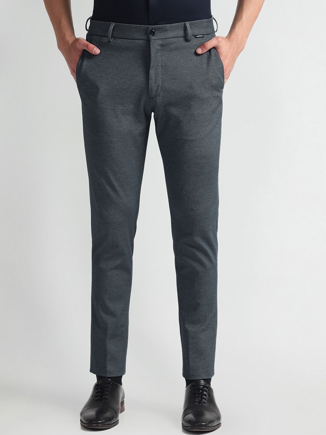 

Arrow New York Men Slim Fit Mid-Rise Slim Fit Chinos Trousers, Blue