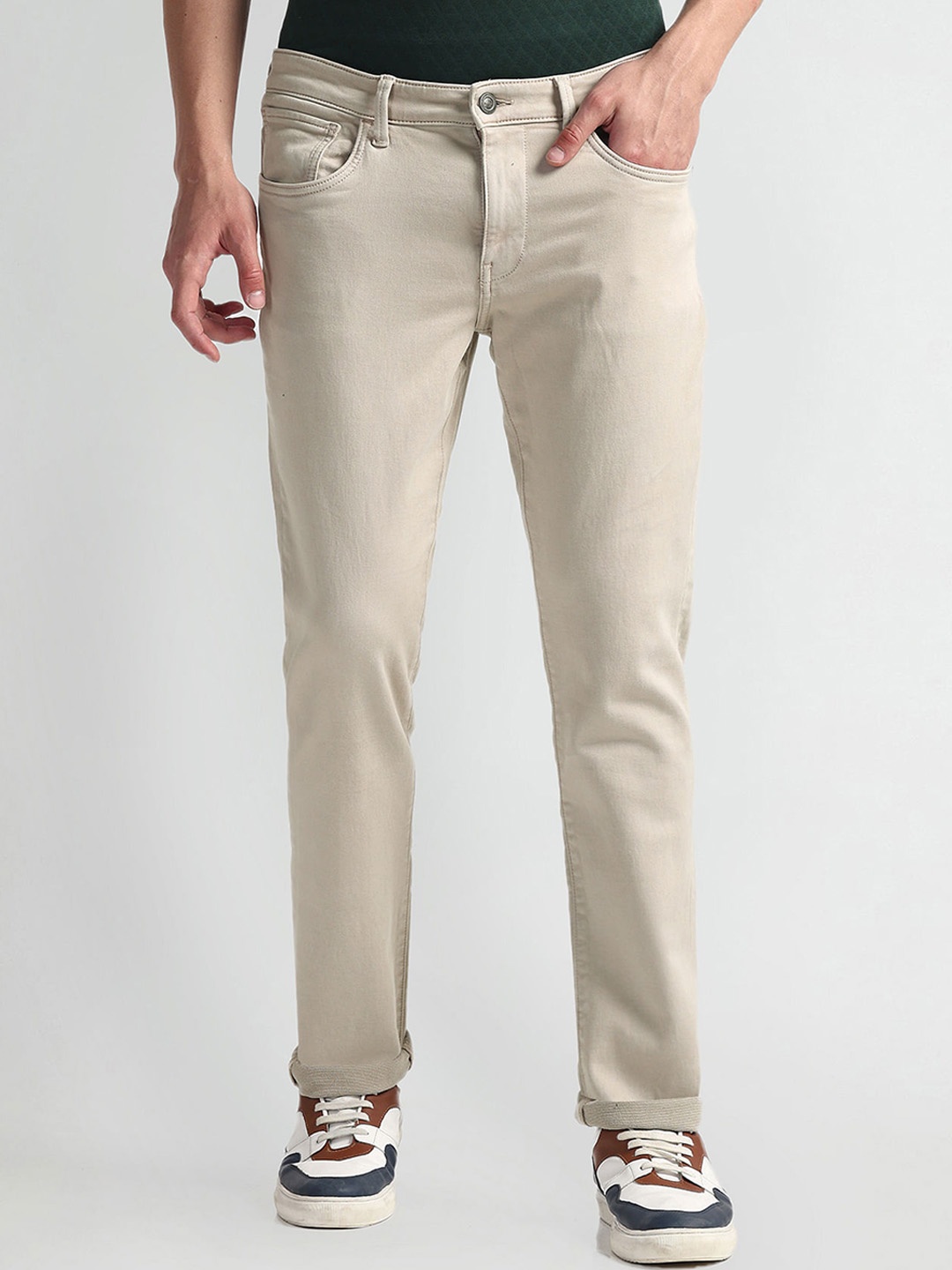 

Arrow Sport Men Slim Fit Mid-Rise Clean Look Stretchable Jeans, Beige