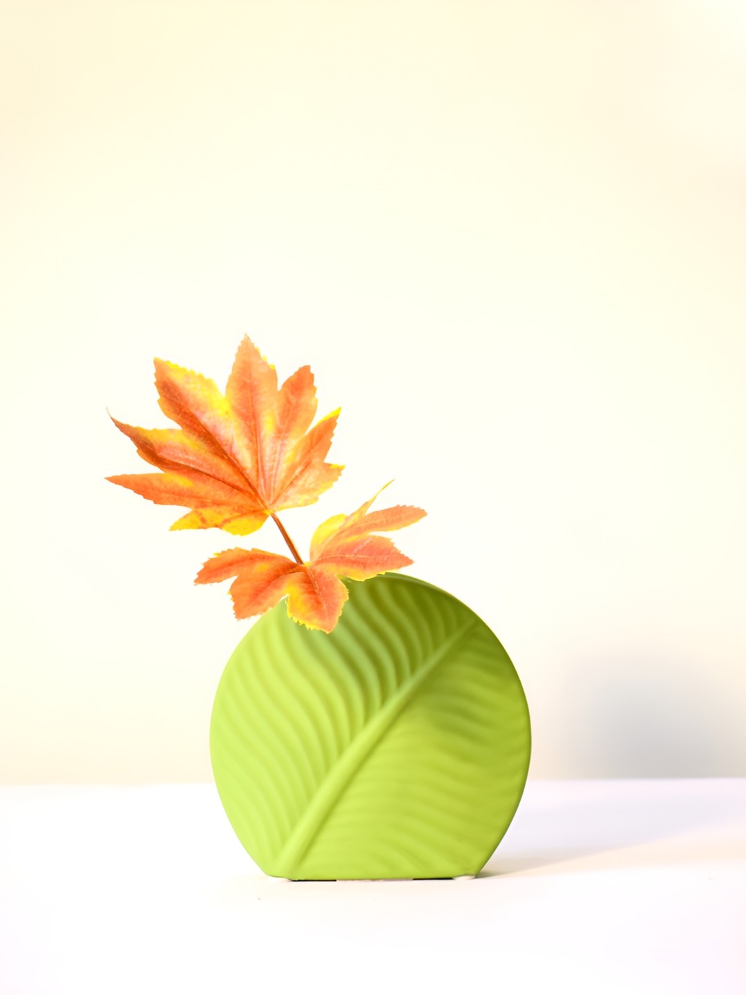 

Morcee Green Textured Ceramic Mint Leaf Vase