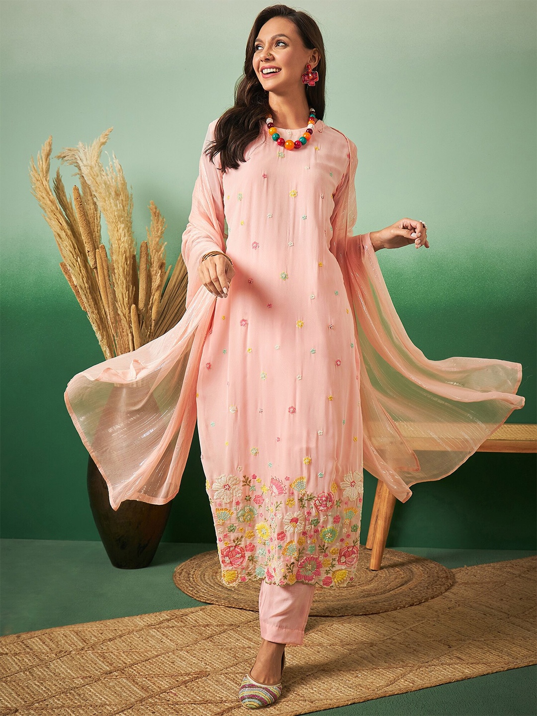 

Sangria Peach Floral Embroidered Unstitched Dress Material