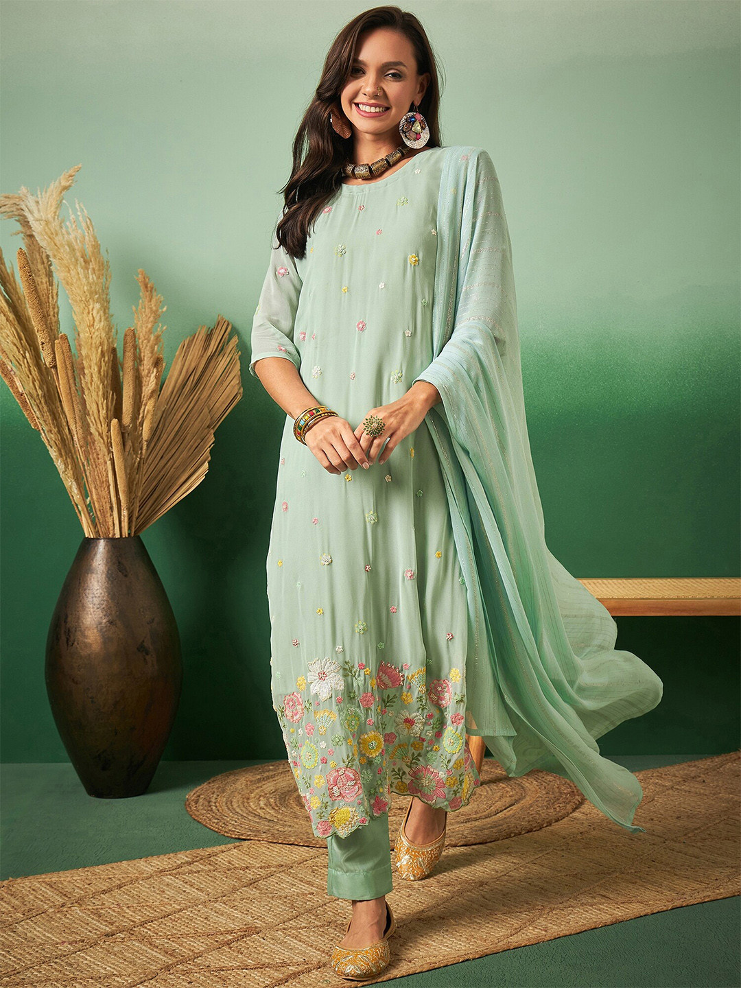 

Sangria Blue Floral Embroidered Unstitched Dress Material