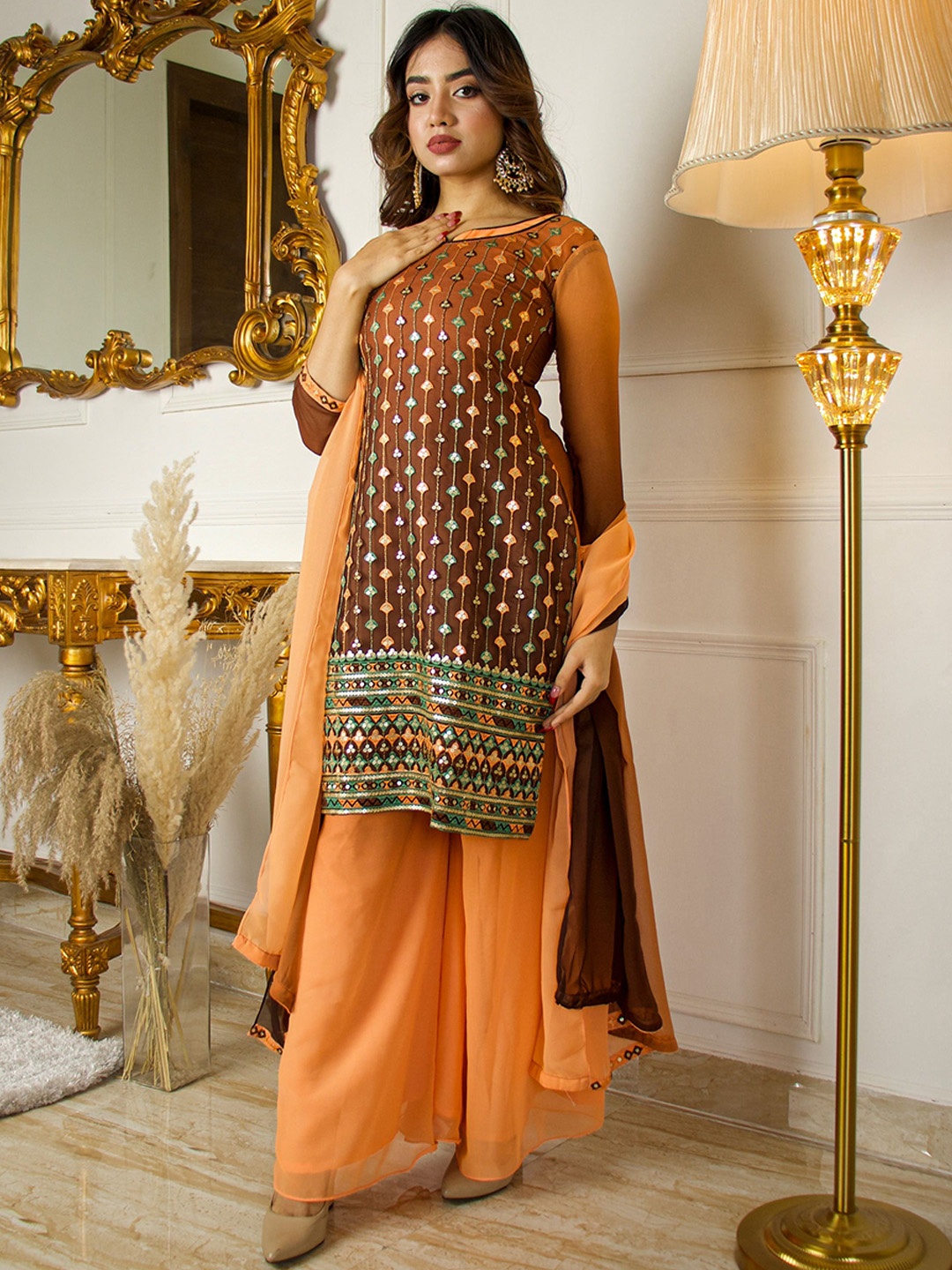 

Vidraa Western Store Floral Embroidered Thread Work Kurta & Palazzos With Dupatta, Orange