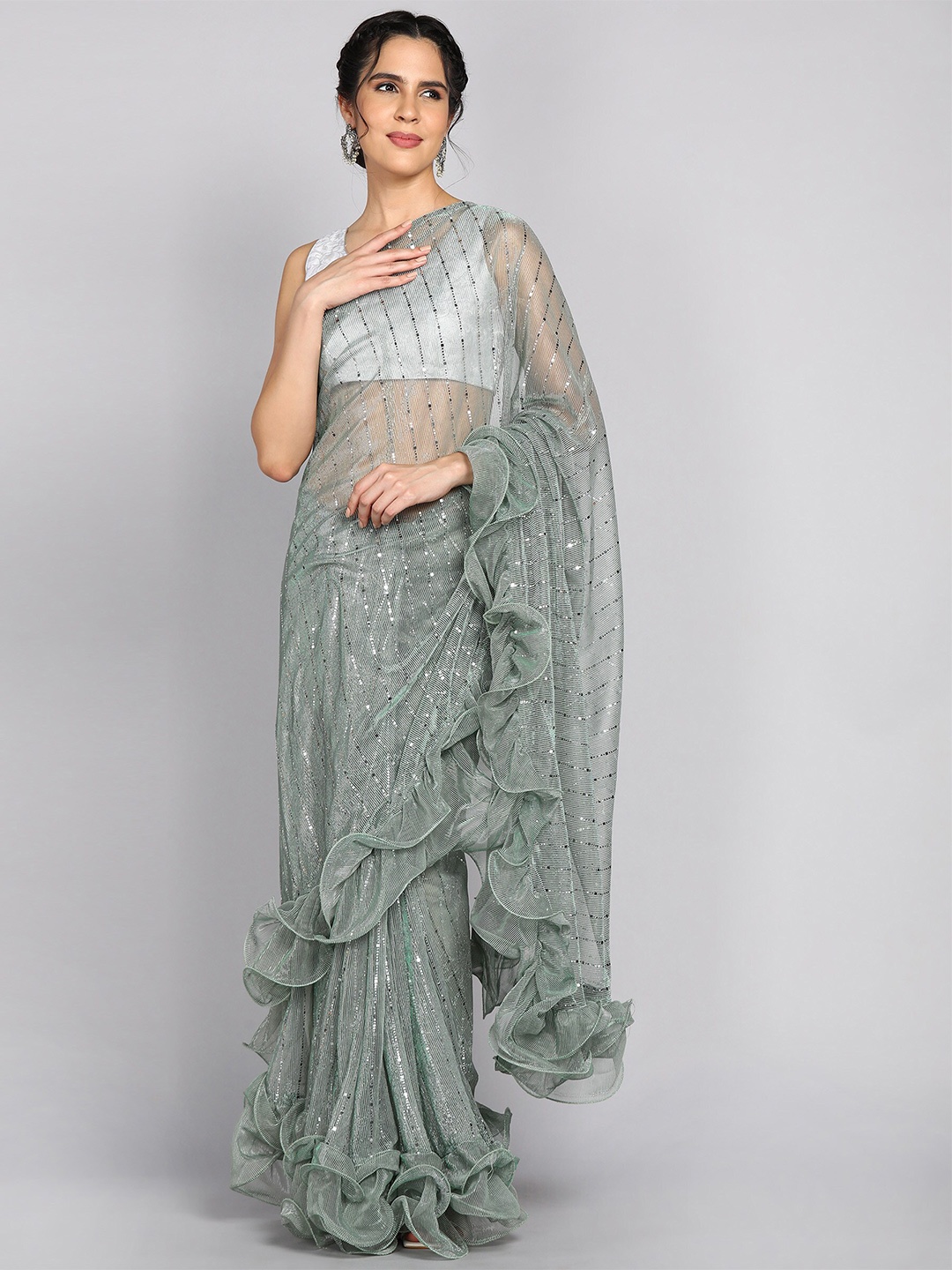 

Mitera Green Embellished Mukaish Saree