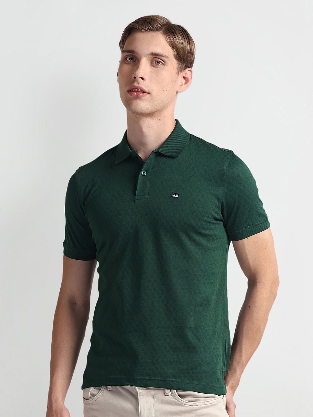 

Arrow Sport Geometric Self Design Polo Collar Casual T-shirt, Green