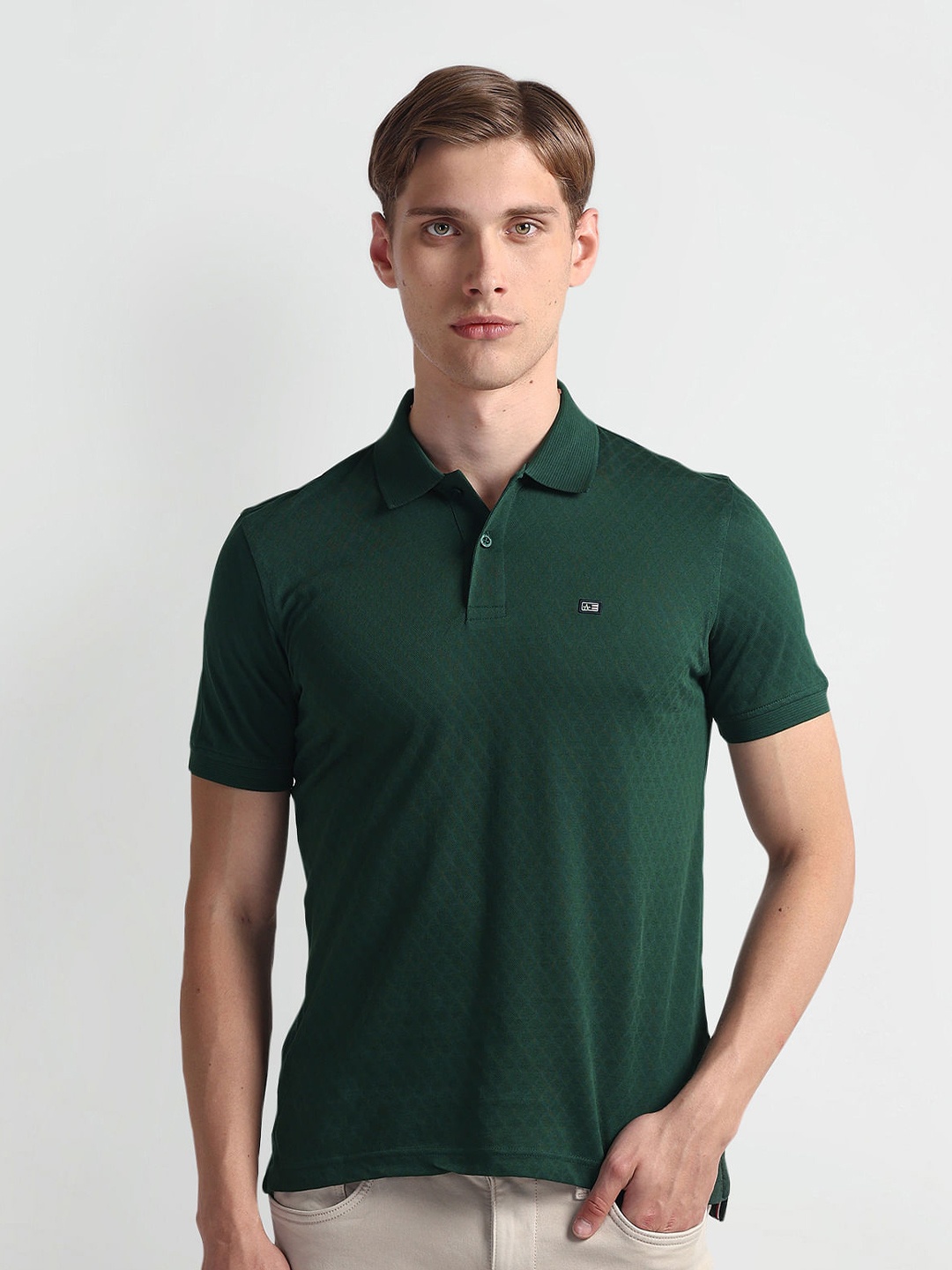 

Arrow Sport Geometric Self Design Polo Collar Casual T-shirt, Green