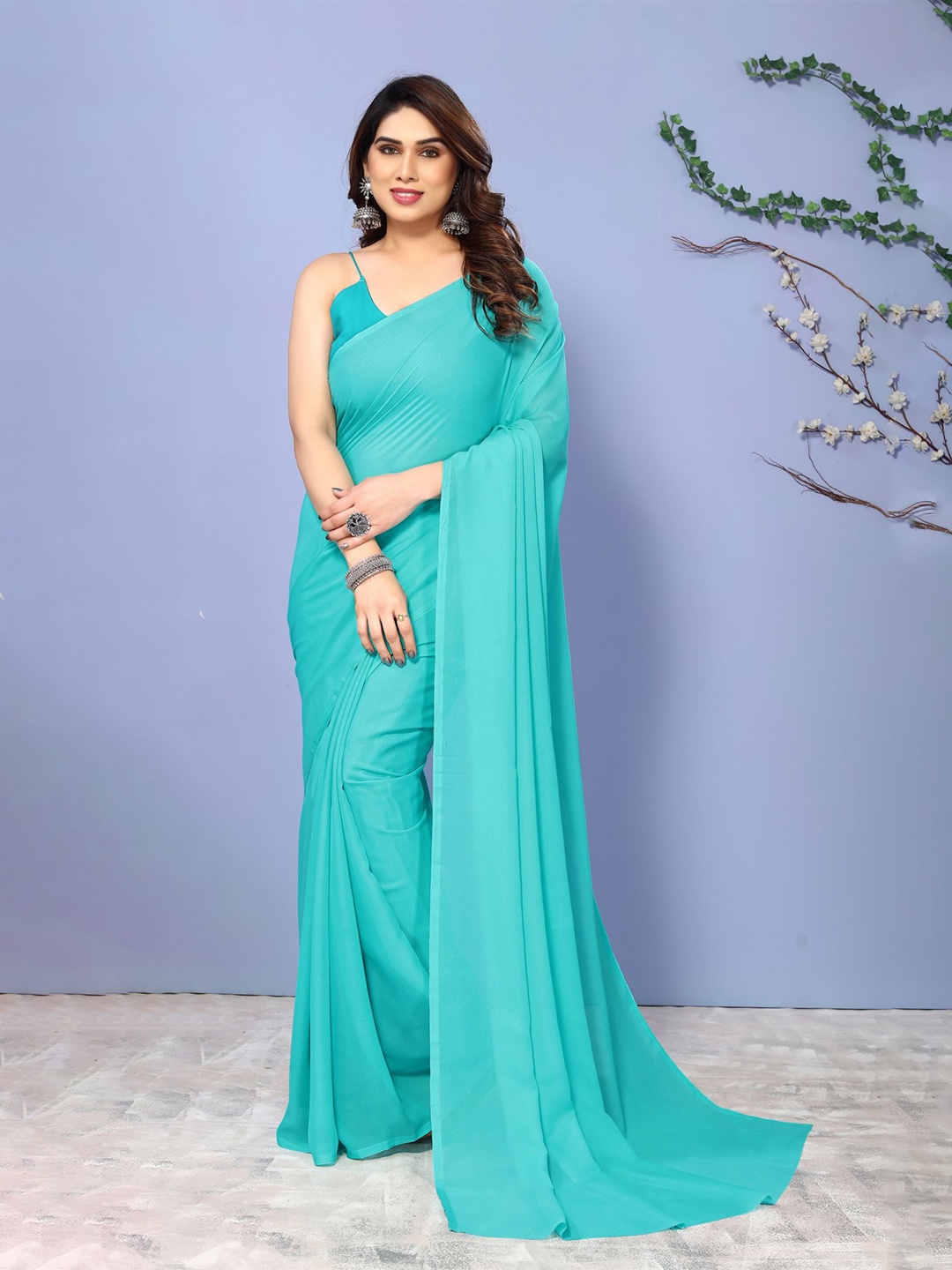 

Moda Rapido Solid Saree With Unstitched Blouse Piece, Blue