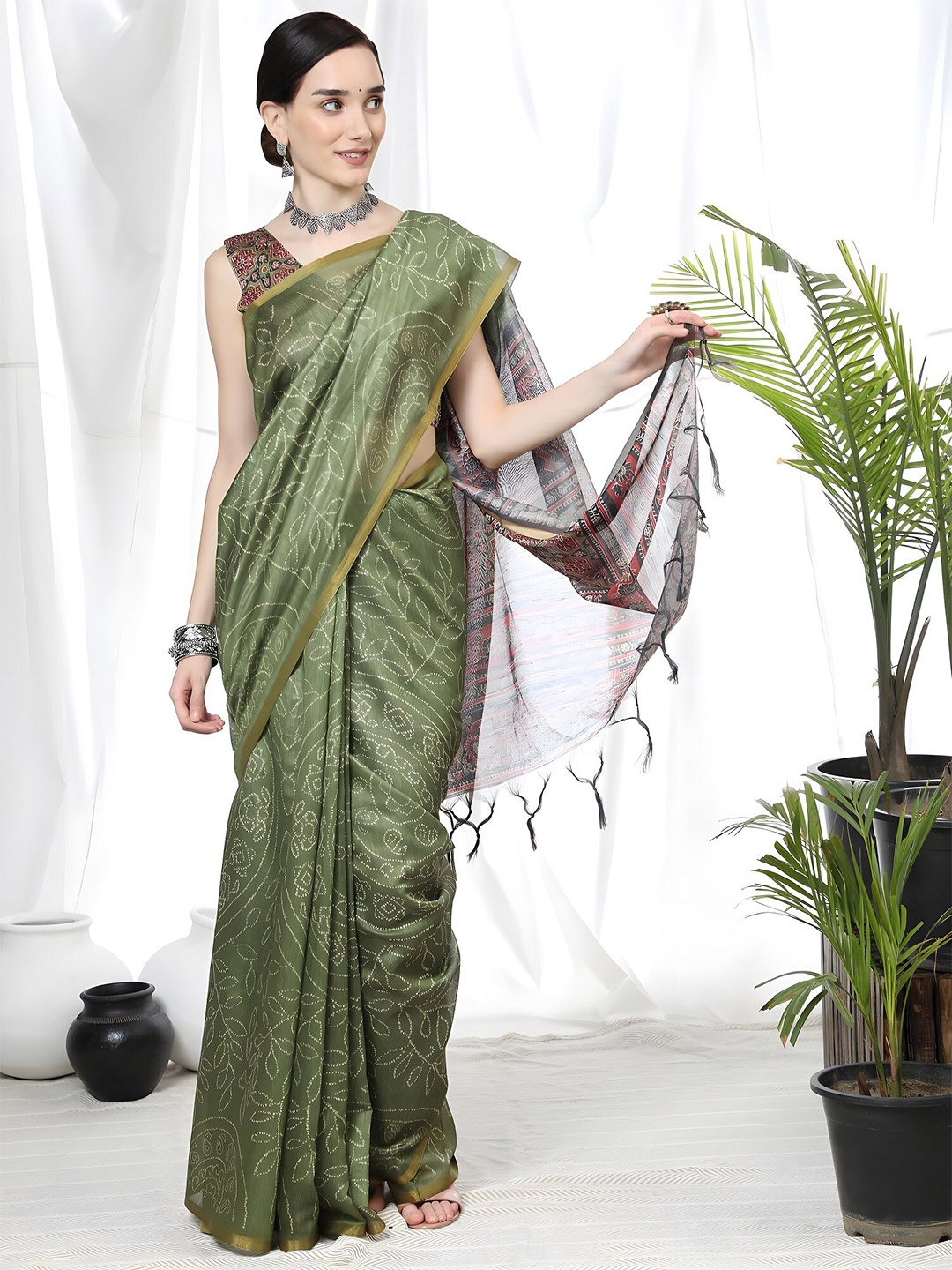 

Anouk Green Printed Bandhani Saree