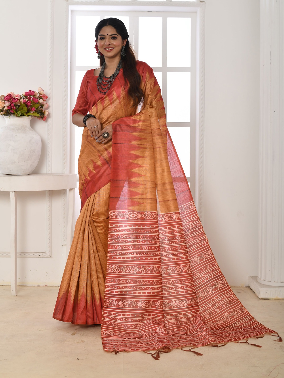 

Anouk Rust Ethnic Motifs Printed Saree