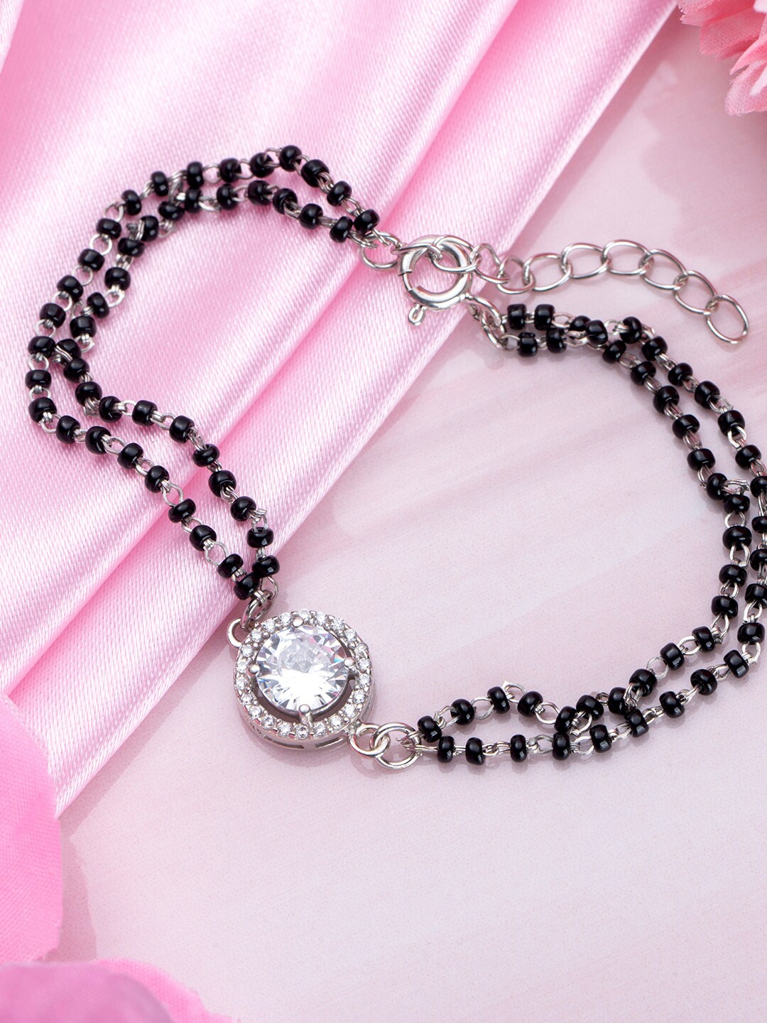 

Zavya 925 Pure Silver Cubic Zirconia Rhodium Plated Charm Bracelet