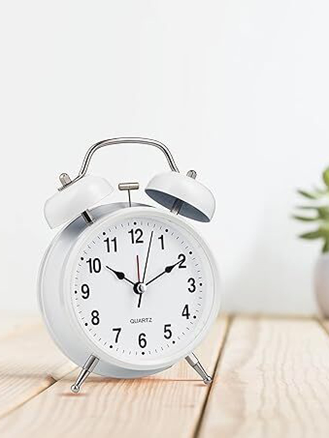 

Sigaram White Round Contemporary Table Clock