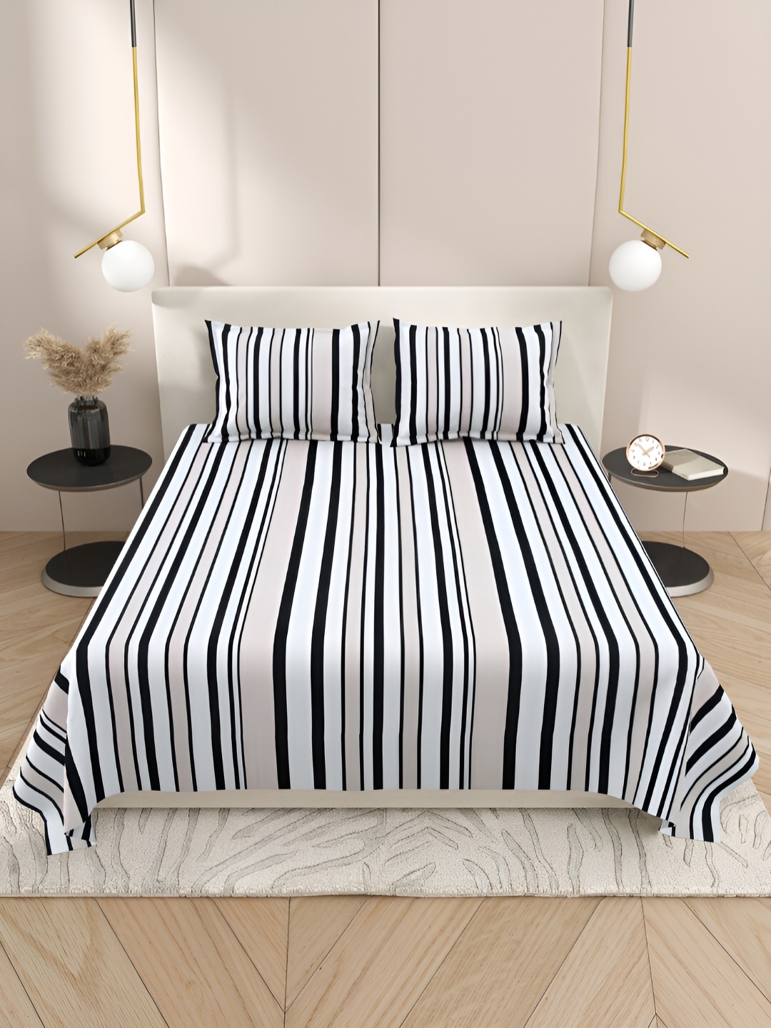 

Aura White & Black Striped Cotton 220 TC King Bedsheet with 2 Pillow Covers