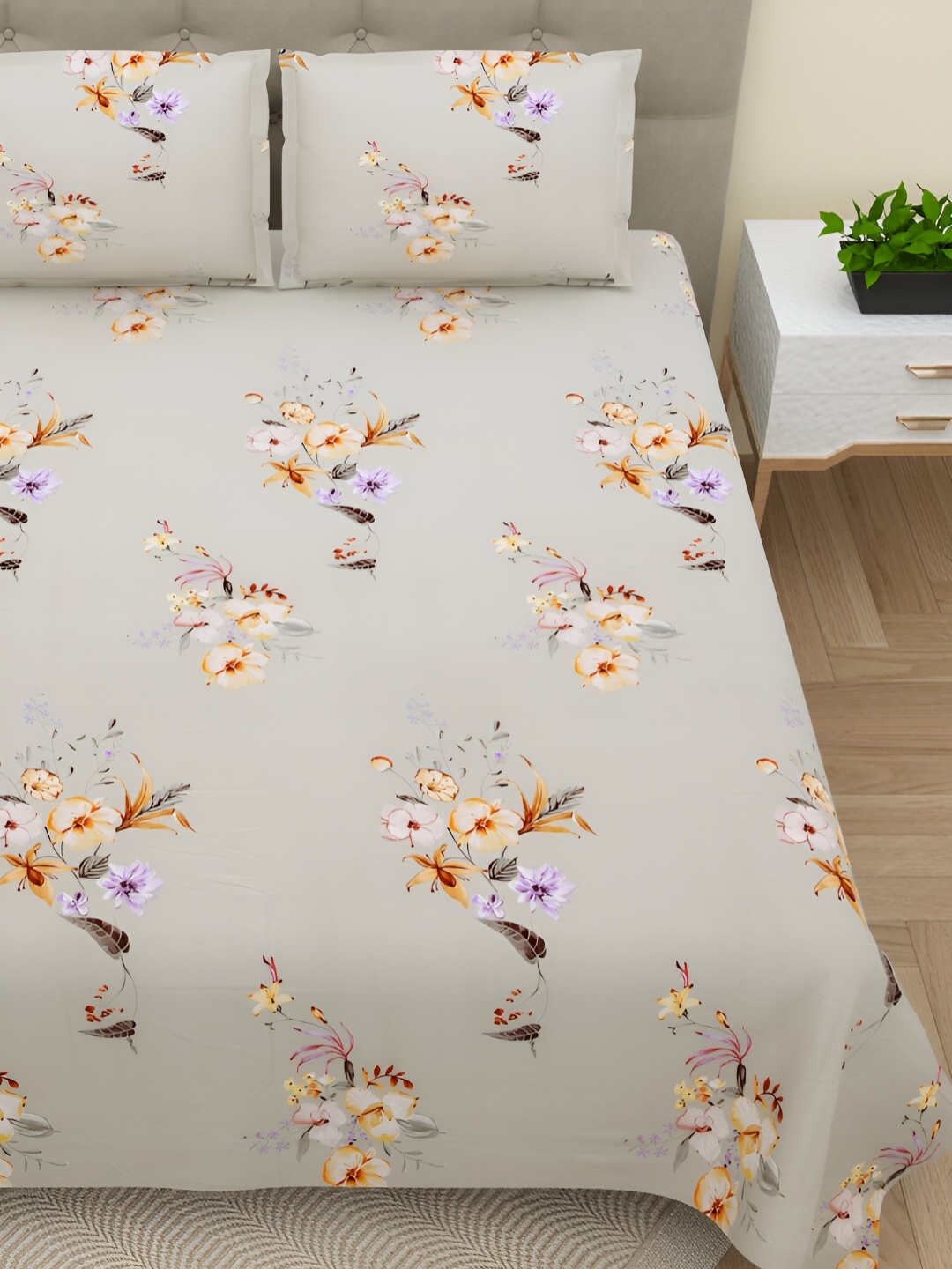 

Aura Brown & Yellow Floral Cotton 220 TC King Bedsheet with 2 Pillow Covers