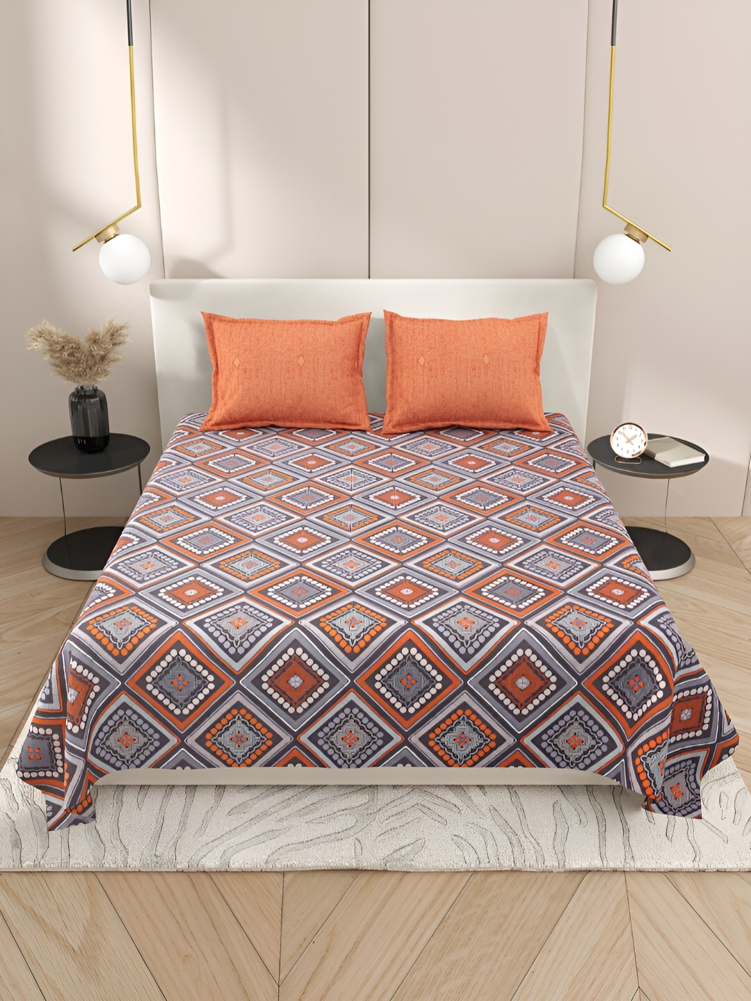 

Aura Grey & Orange Geometric Cotton 220 TC King Bedsheet with 2 Pillow Covers