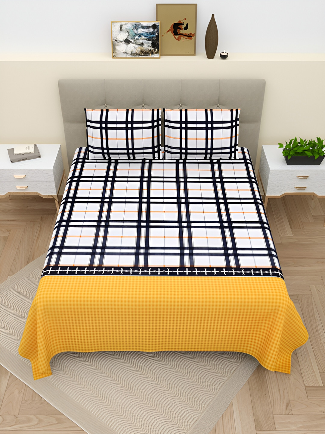

Aura White & Black Geometric Cotton 220 TC King Bedsheet with 2 Pillow Covers