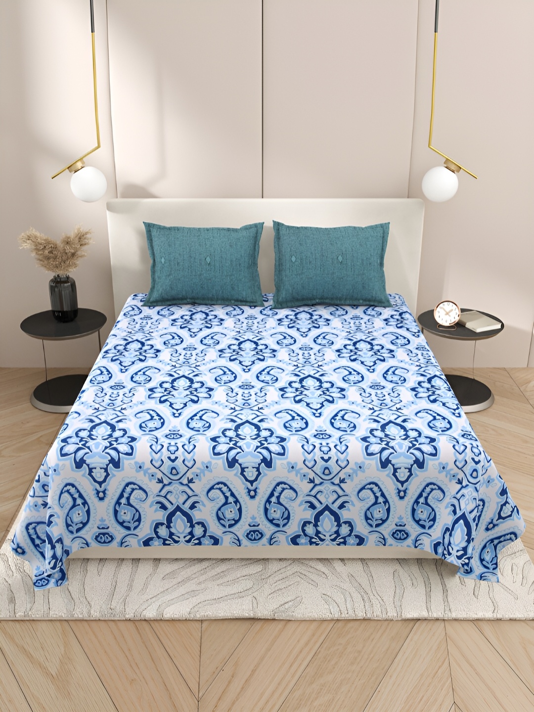 

Aura Blue & White Ethnic Motifs Cotton 220 TC King Bedsheet with 2 Pillow Covers