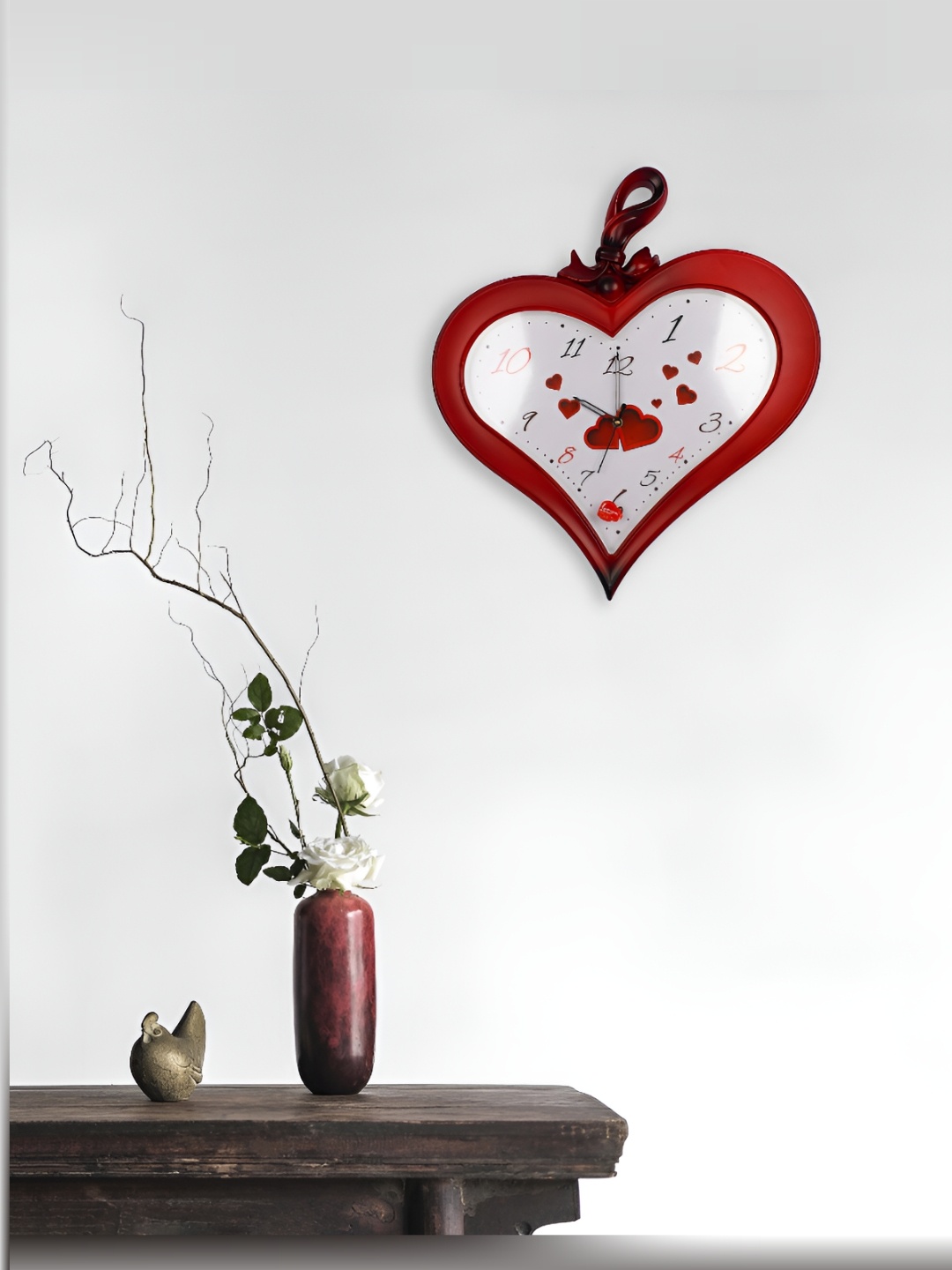 

Sigaram Maroon Textured Regular Wall Clock