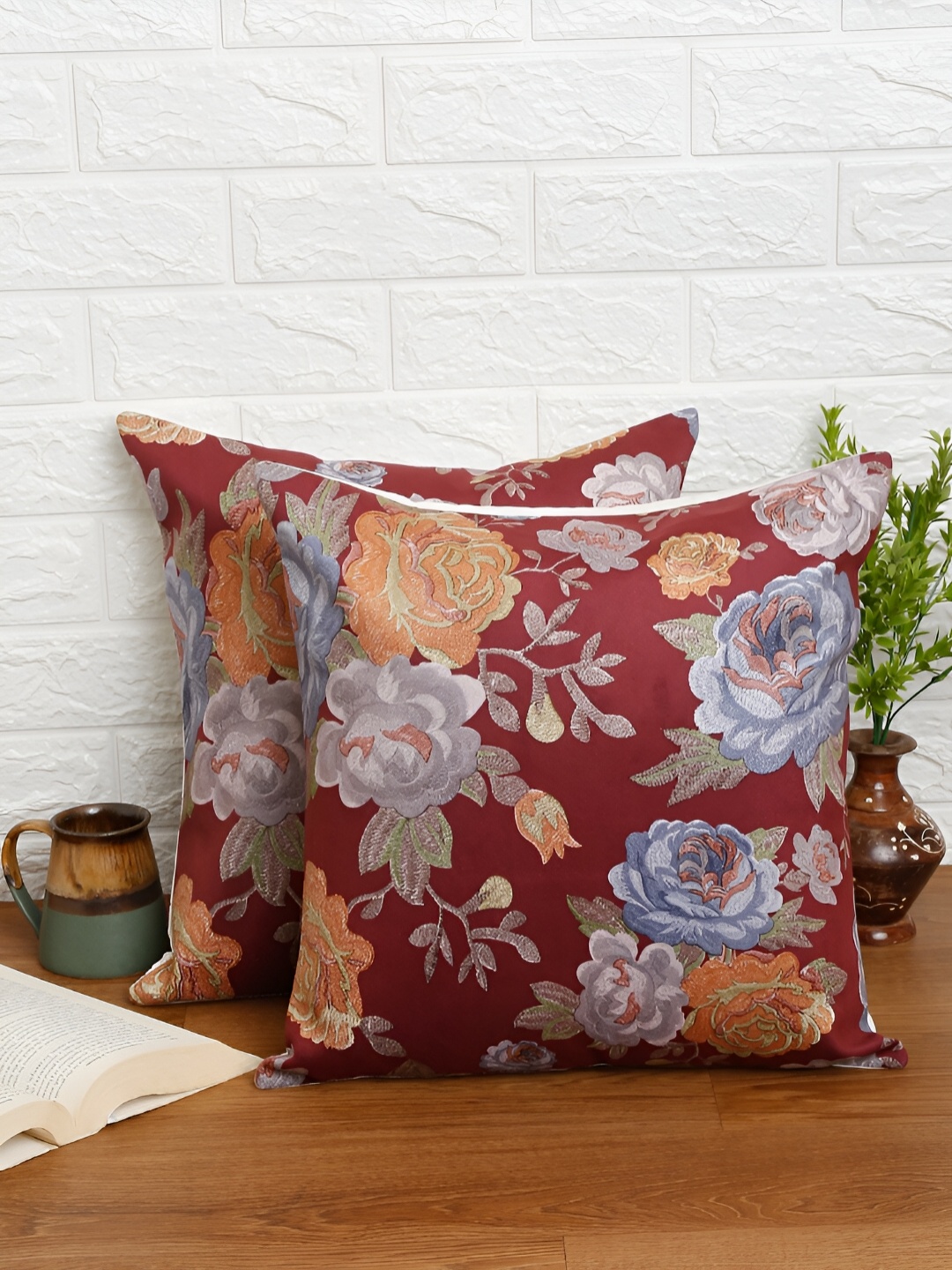 

Aura Maroon & Blue 2 Pieces Floral Embroidered Velvet Square Cushion Covers