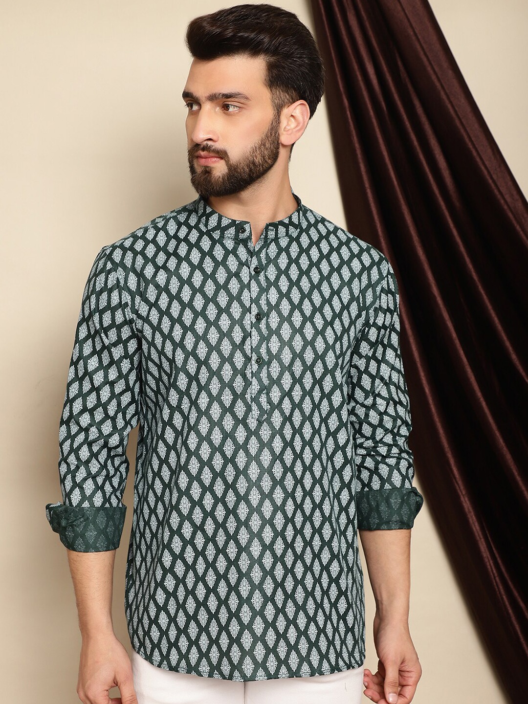 

Anouk Ethnic Motifs Printed Thread Work Short Kurta, Green