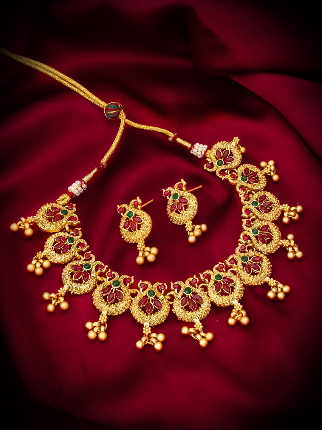 

aadita Gold-Plated Stones Studded & Beads Beaded Jewellery Set
