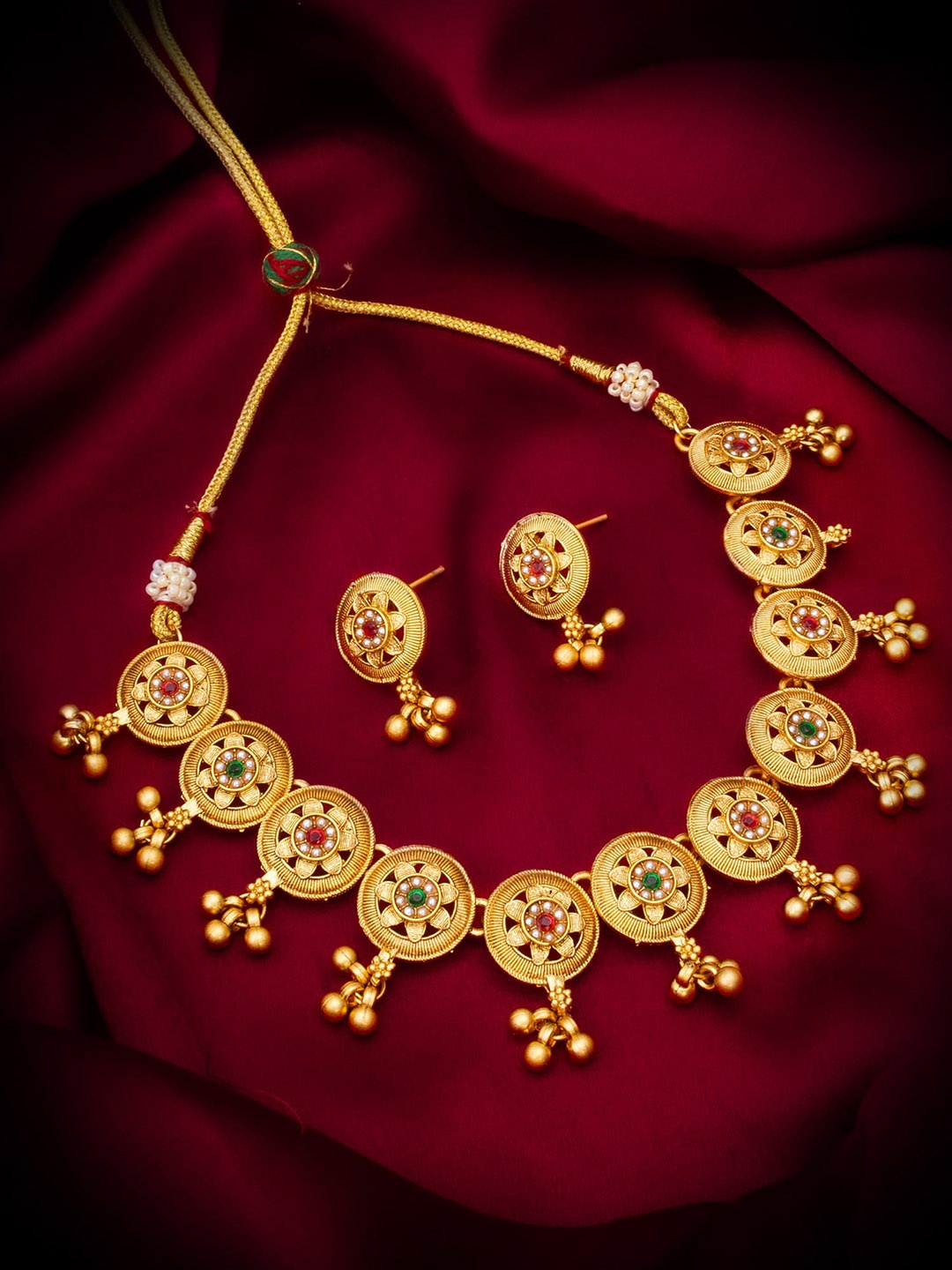 

aadita Gold-Plated Stones Studded & Beads Beaded Jewellery Set