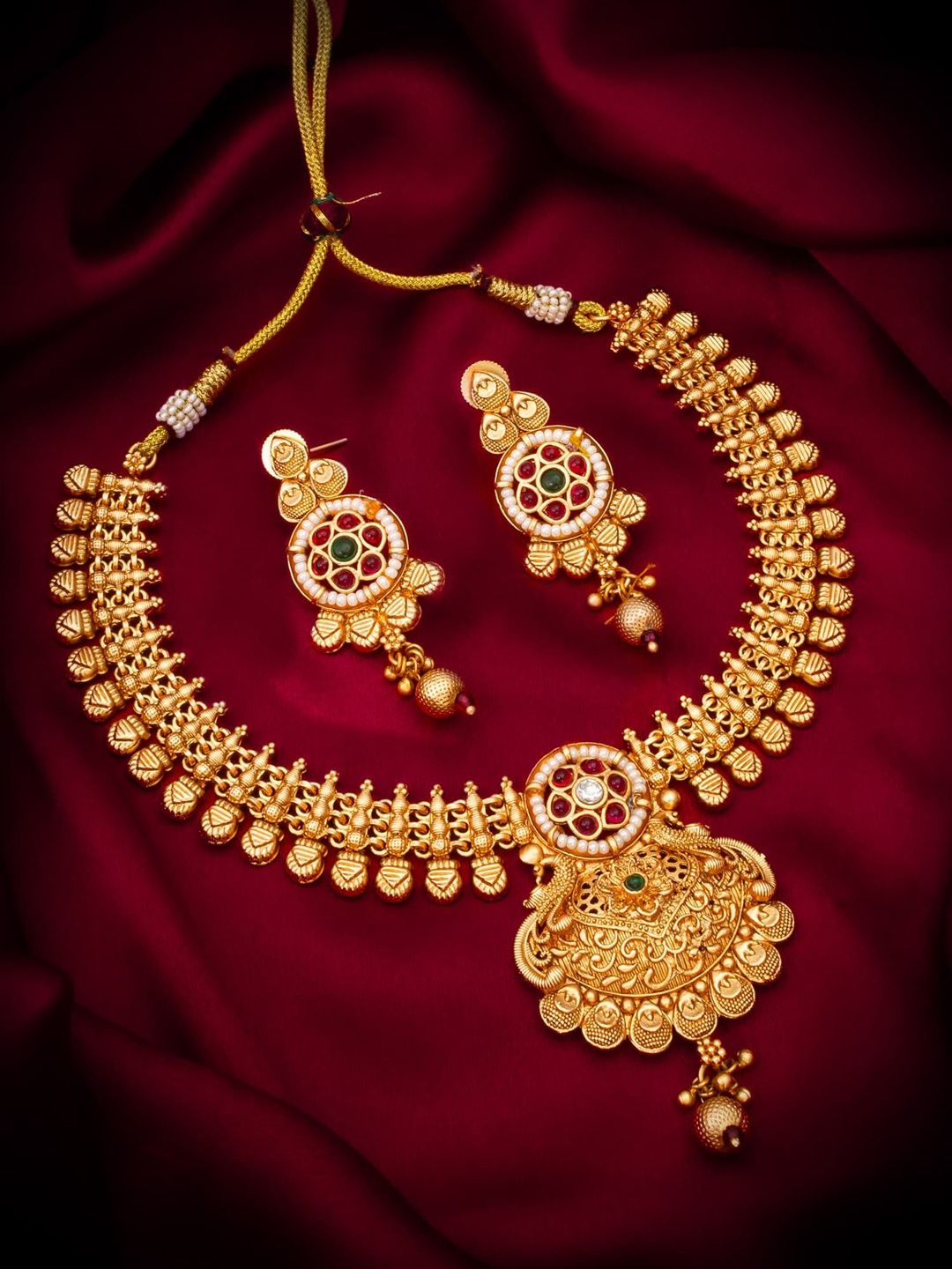 

aadita Gold-Plated Stones Studded & Beads Beaded Jewellery Set