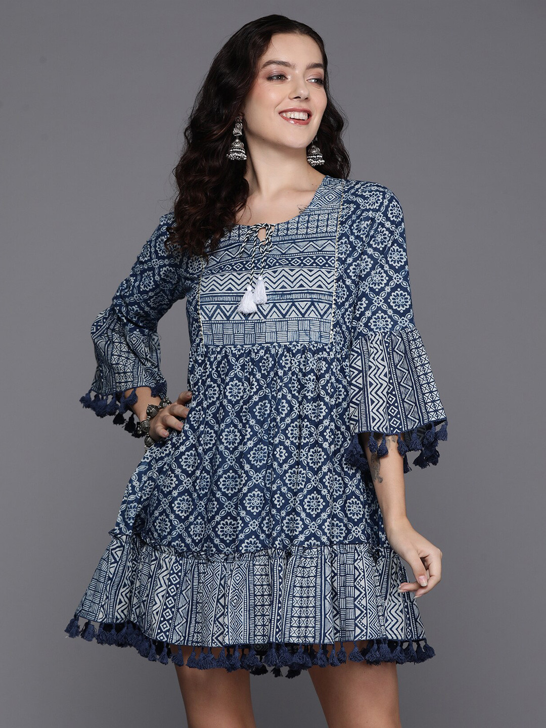

Anouk Ethnic Motifs Printed Bell Sleeve Fringed A-Line Tie-Up Neck Cotton Dress, Blue