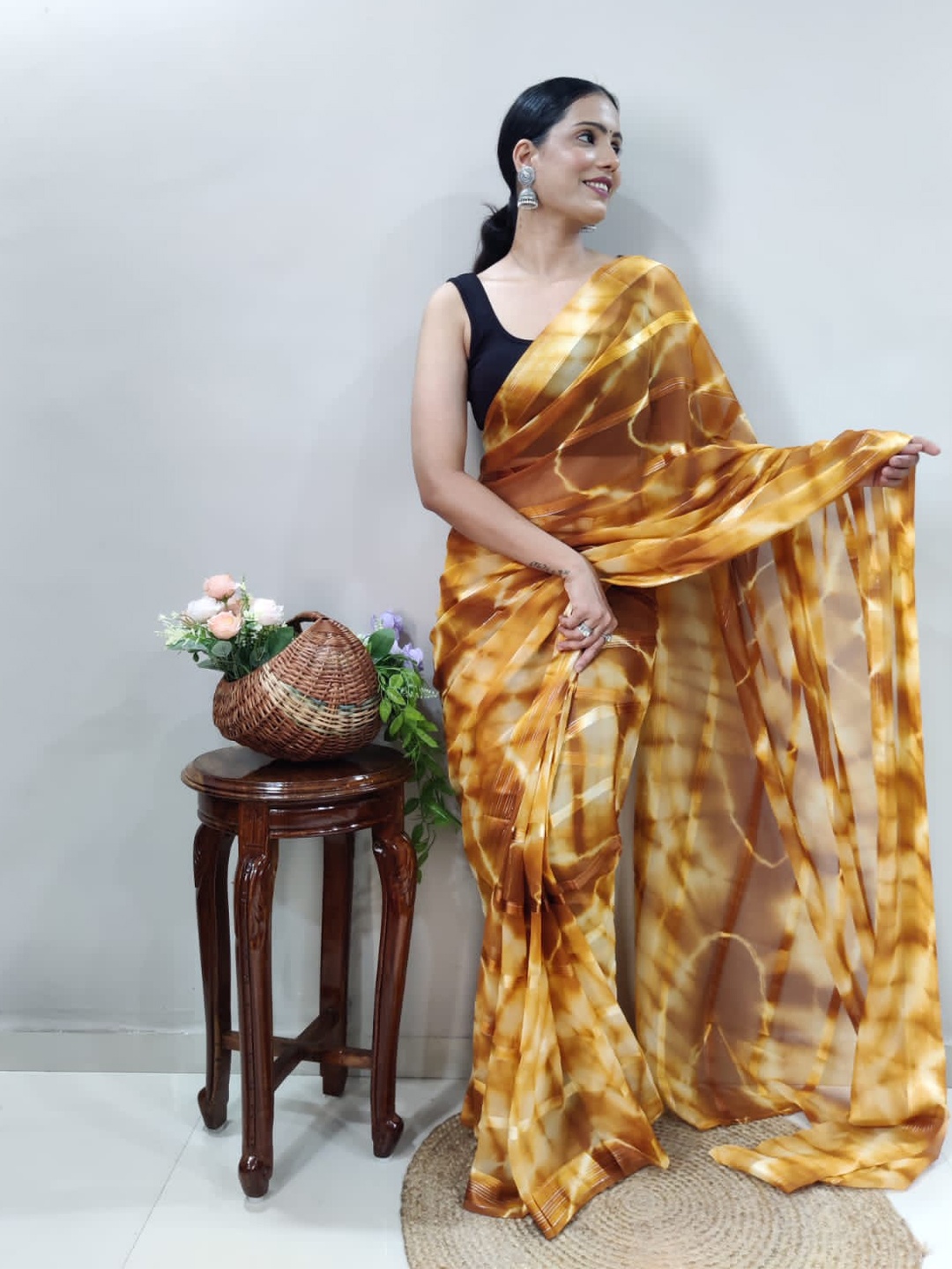 

Naishu Trendz Tie And Dye Poly Georgette Ready to Wear Saree, Yellow