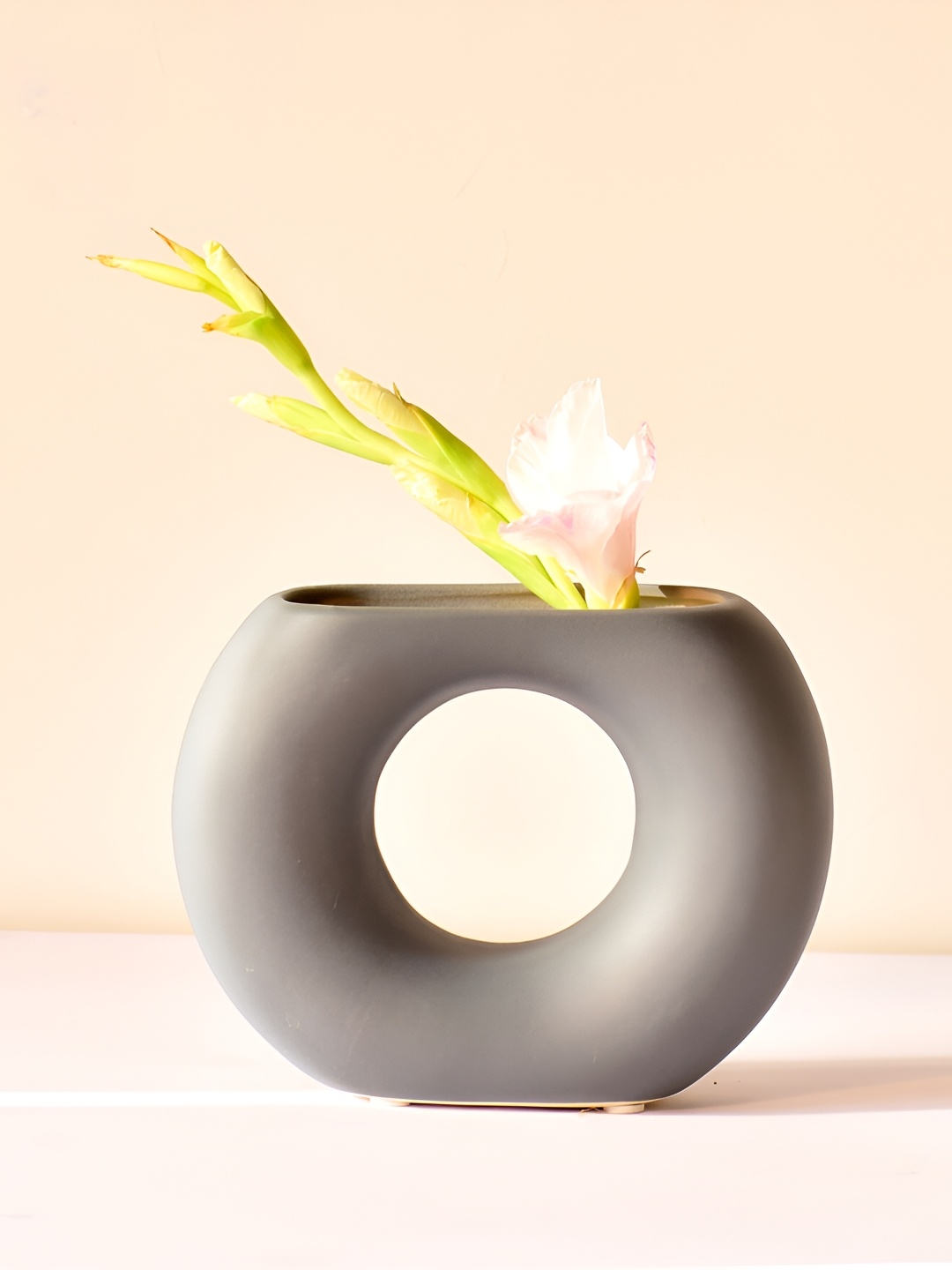 

Morcee Grey Textured Ceramic Donut Vase