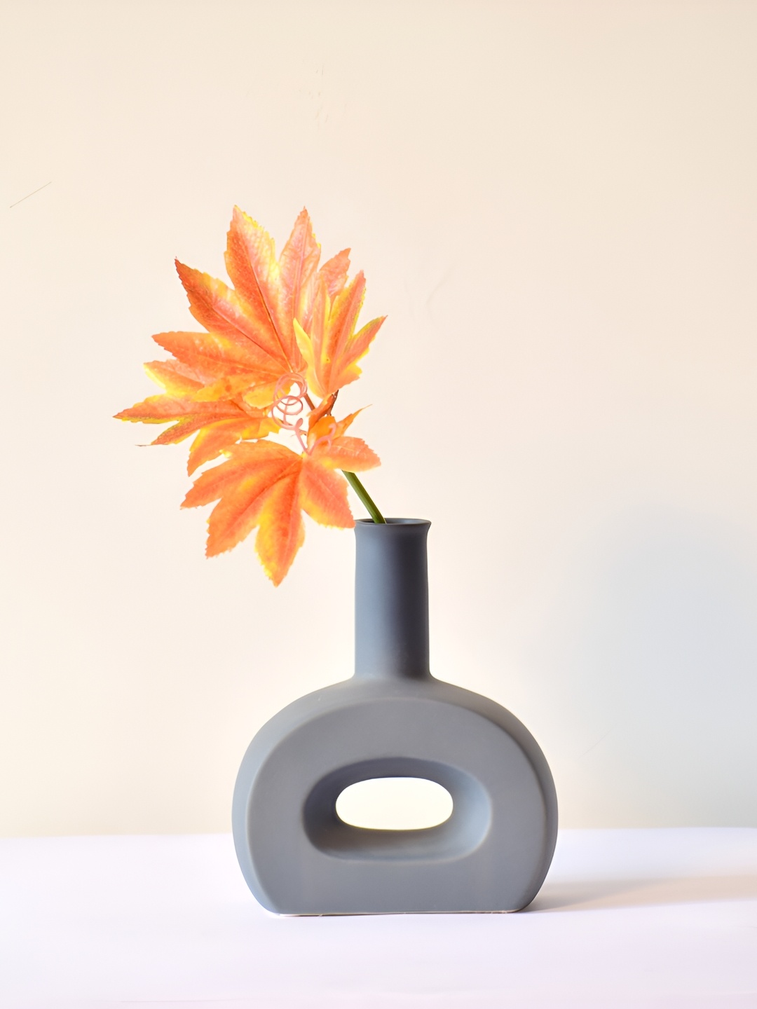 

Morcee Grey Textured Ceramic Flat Vase