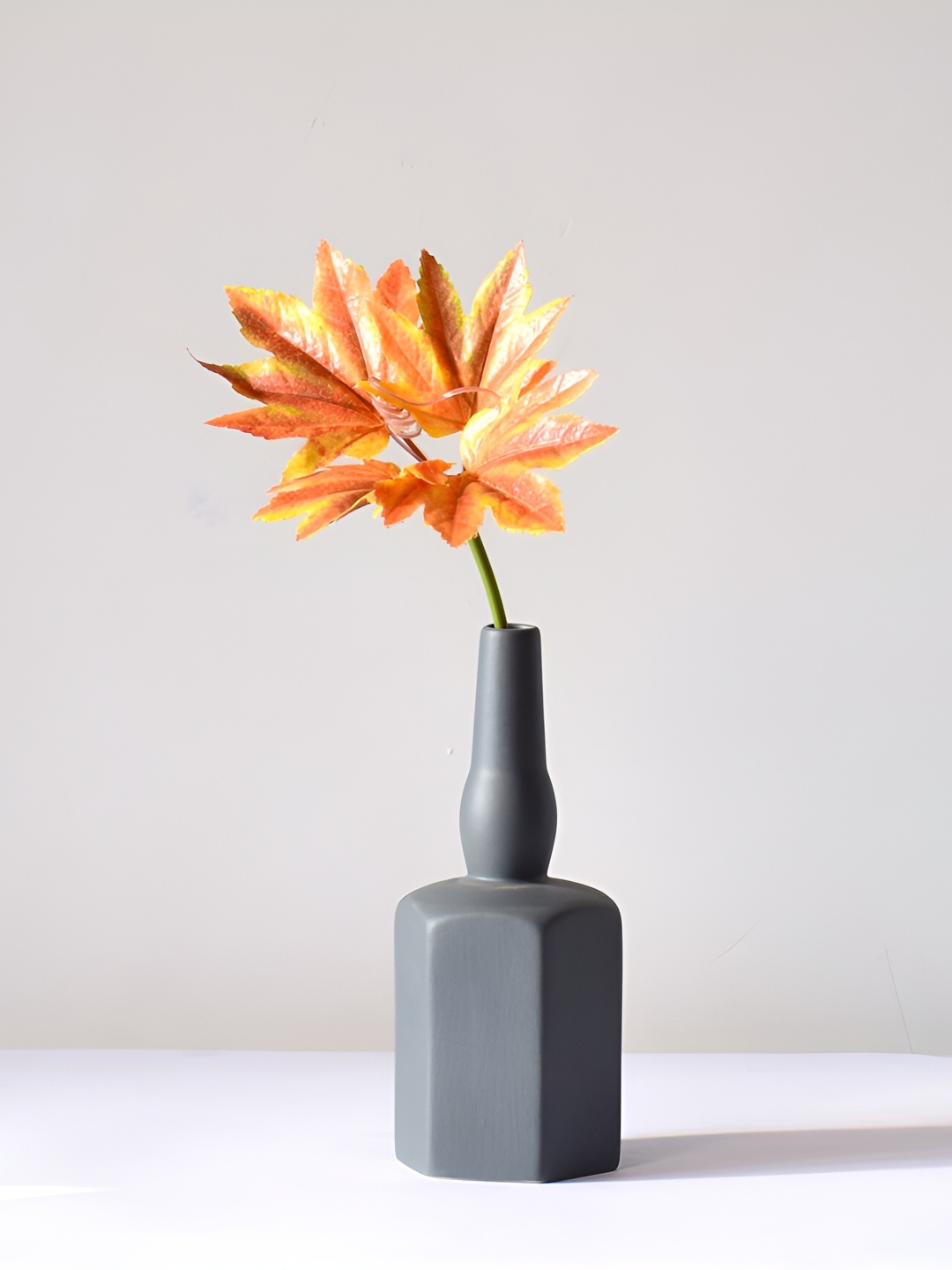 

Morcee Charcoal Black Textured Ceramic Wine Bottle Vase