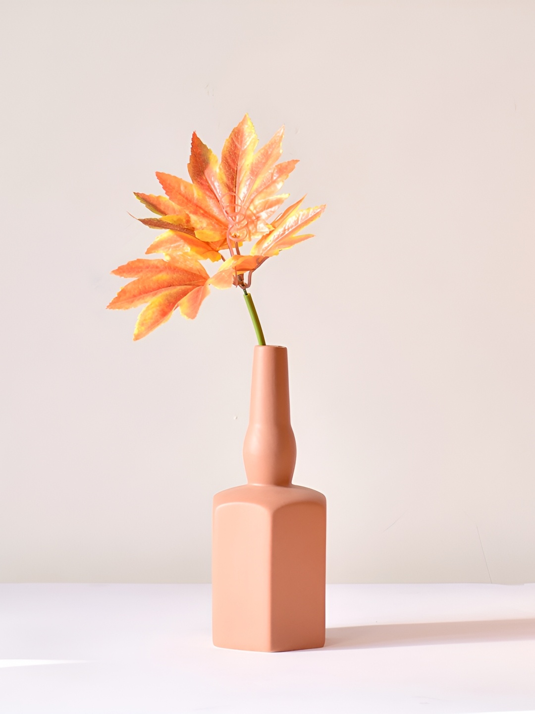 

Morcee Pink Textured Ceramic Wine Bottle Vase