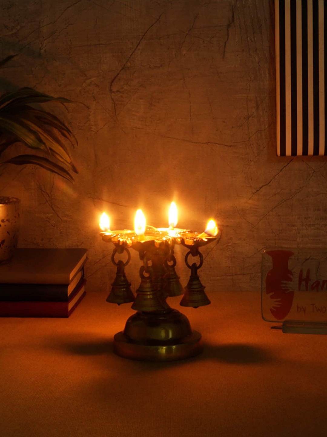 

Two Moustaches Yellow 4 Oil Wick Brass Diya With Bells