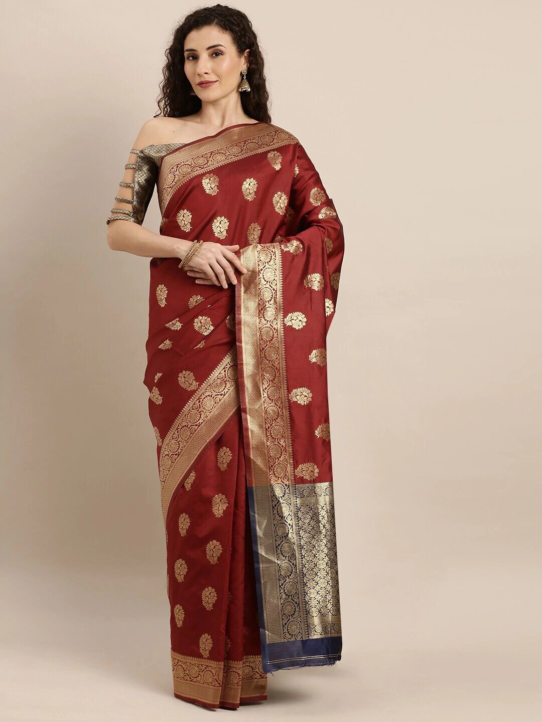 

Mitera Maroon Ethnic Motifs Woven Design Zari Silk Blend Kanjeevaram Saree