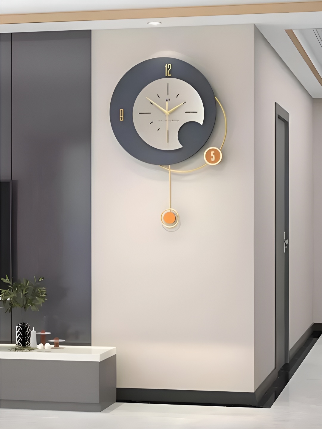 

The Art House Grey & Orange Abstract Shaped Traditional Wall Clock