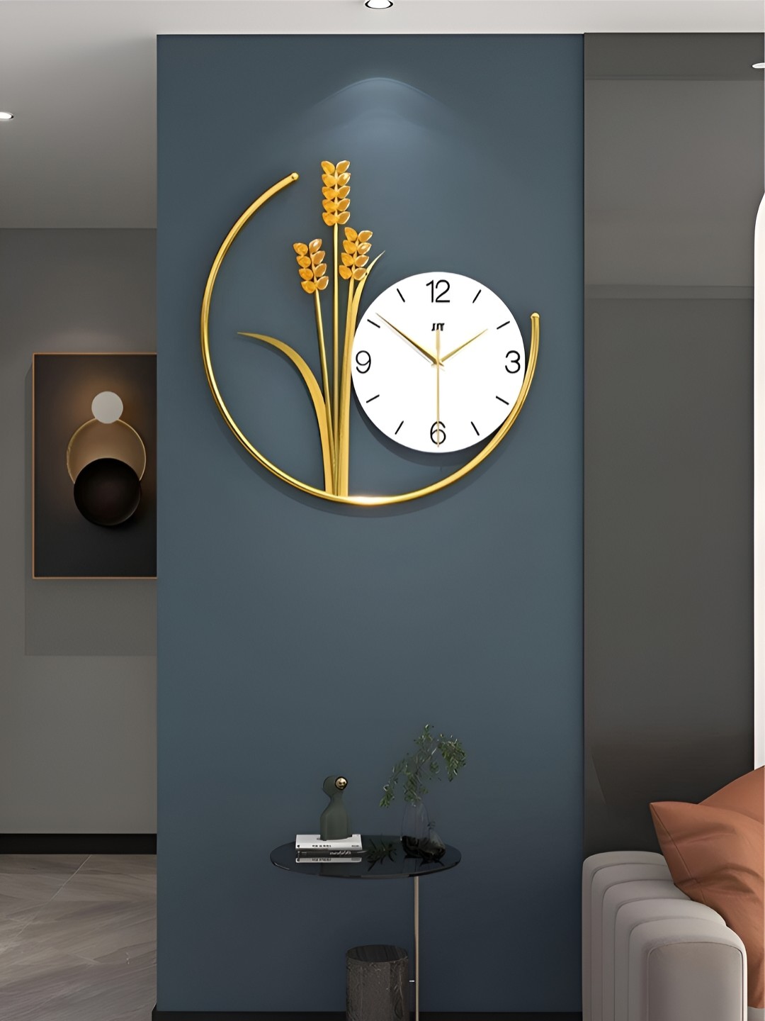 

The Art House Orange & Gold-Toned Embellished Abstract Shaped Traditional Wall Clock