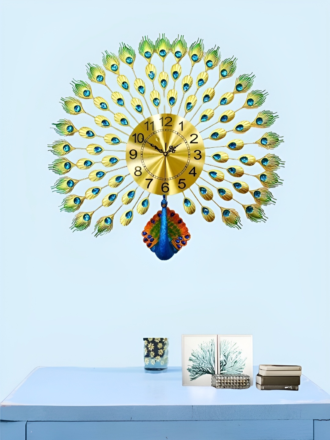 

The Art House Gold-Toned & Blue Embellished Animal Shaped Traditional Wall Clock