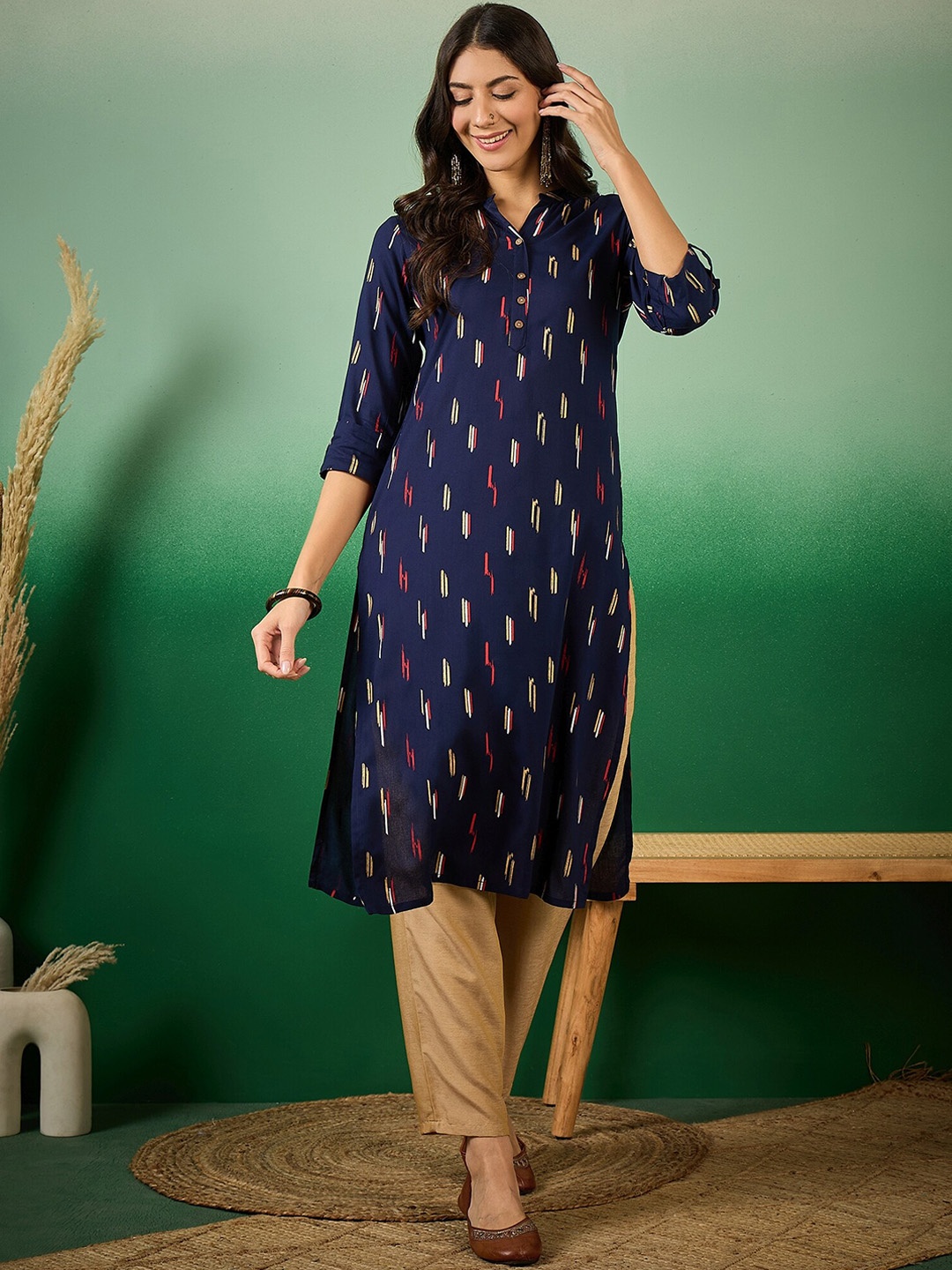 

Vastramyaa Geometric Printed Mandarin Collar Roll Up Sleeves Cotton Straight Kurta, Navy blue