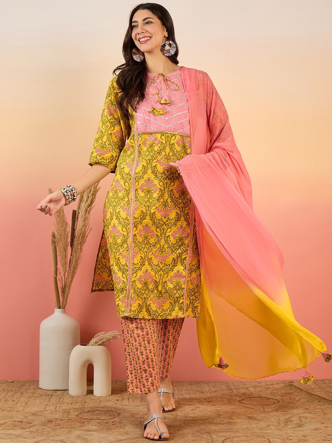 

Vastramyaa Floral Printed Regular Gotta Patti Pure Cotton Kurta with Trousers & Dupatta, Mustard
