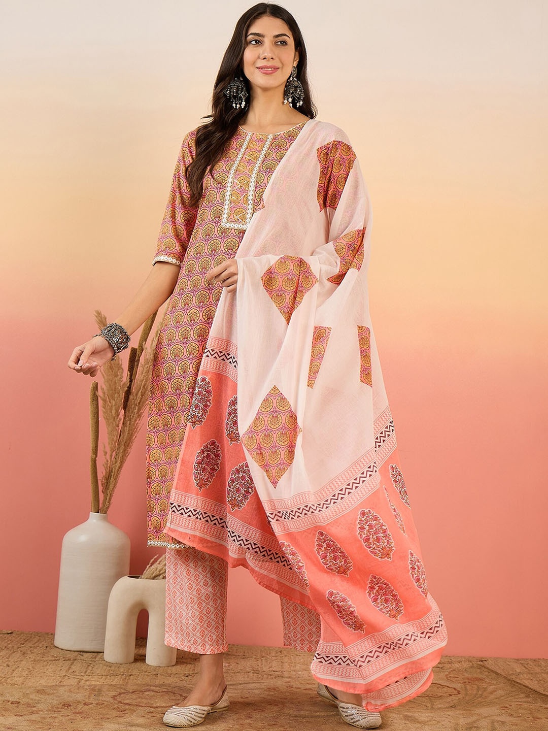 

Vastramyaa Ethnic Motifs Printed Regular Gotta Patti Cotton Kurta With Trousers & Dupatta, Peach