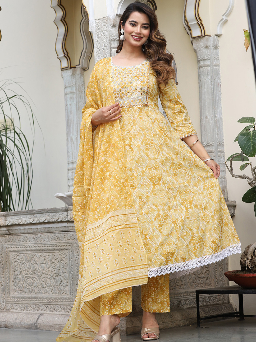

SINGNI Ethnic Motifs Embroidered Round Neck Three-Quarter Sleeves Pure Cotton Kurta Set, Mustard