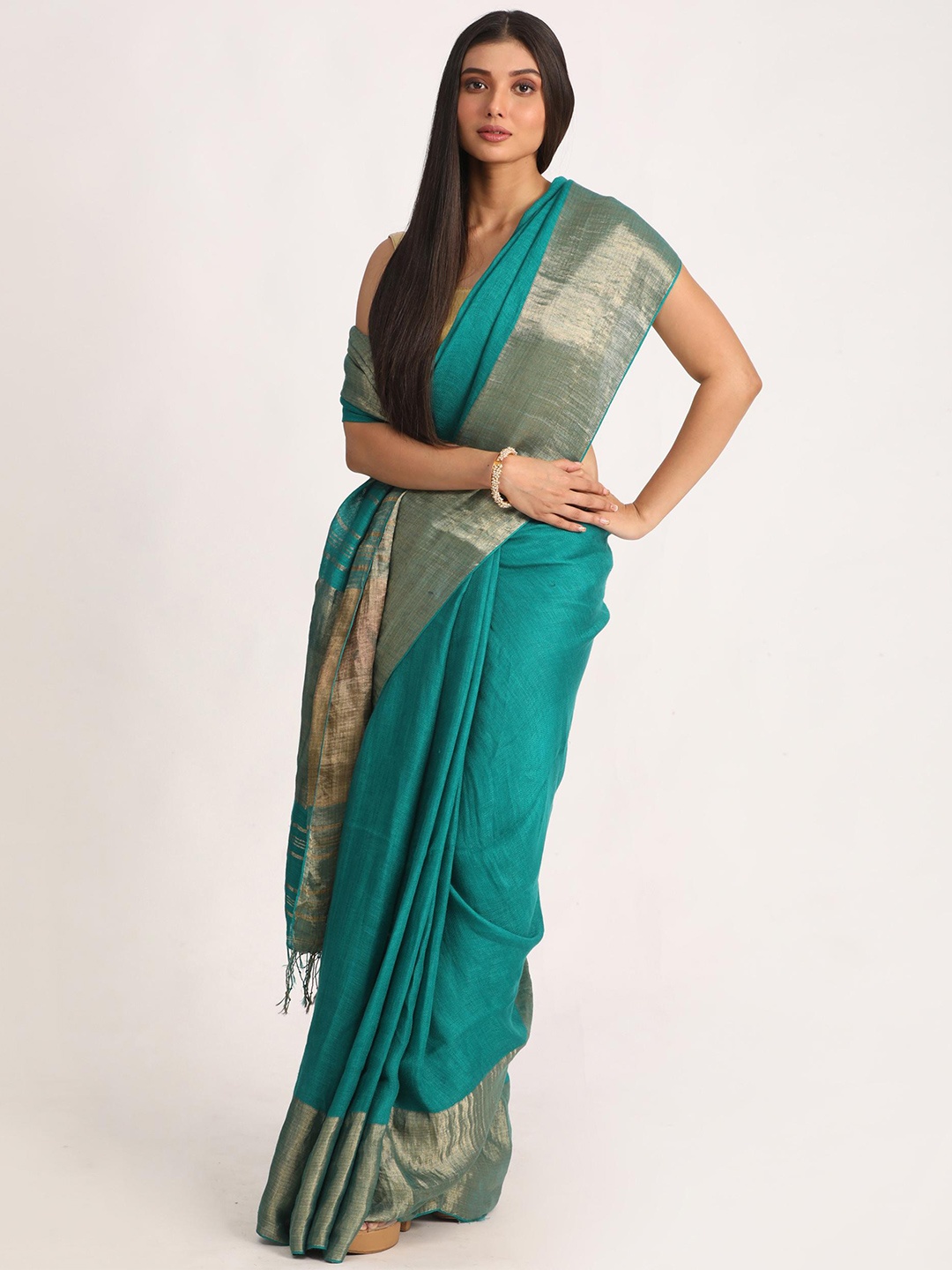 

Angoshobha Zari Pure Linen Saree, Turquoise blue