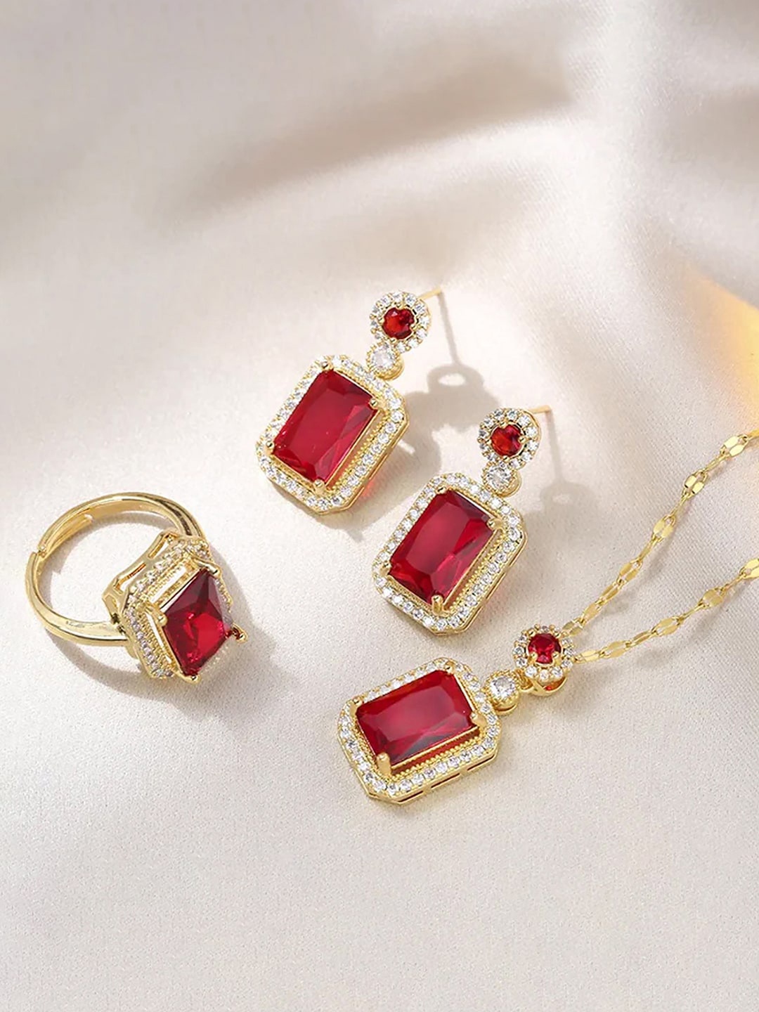

Peora Gold Plated Cubic Zirconia Studded Jewellery Set, Red