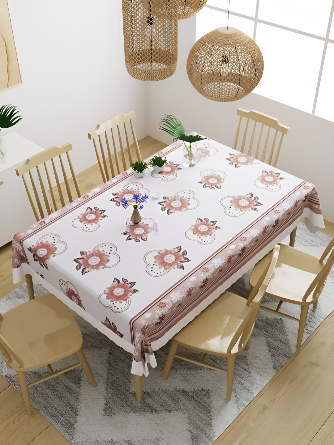 

Aura White & Brown Floral Waterproof Plastic 6-Seater Table Cover with Textured details