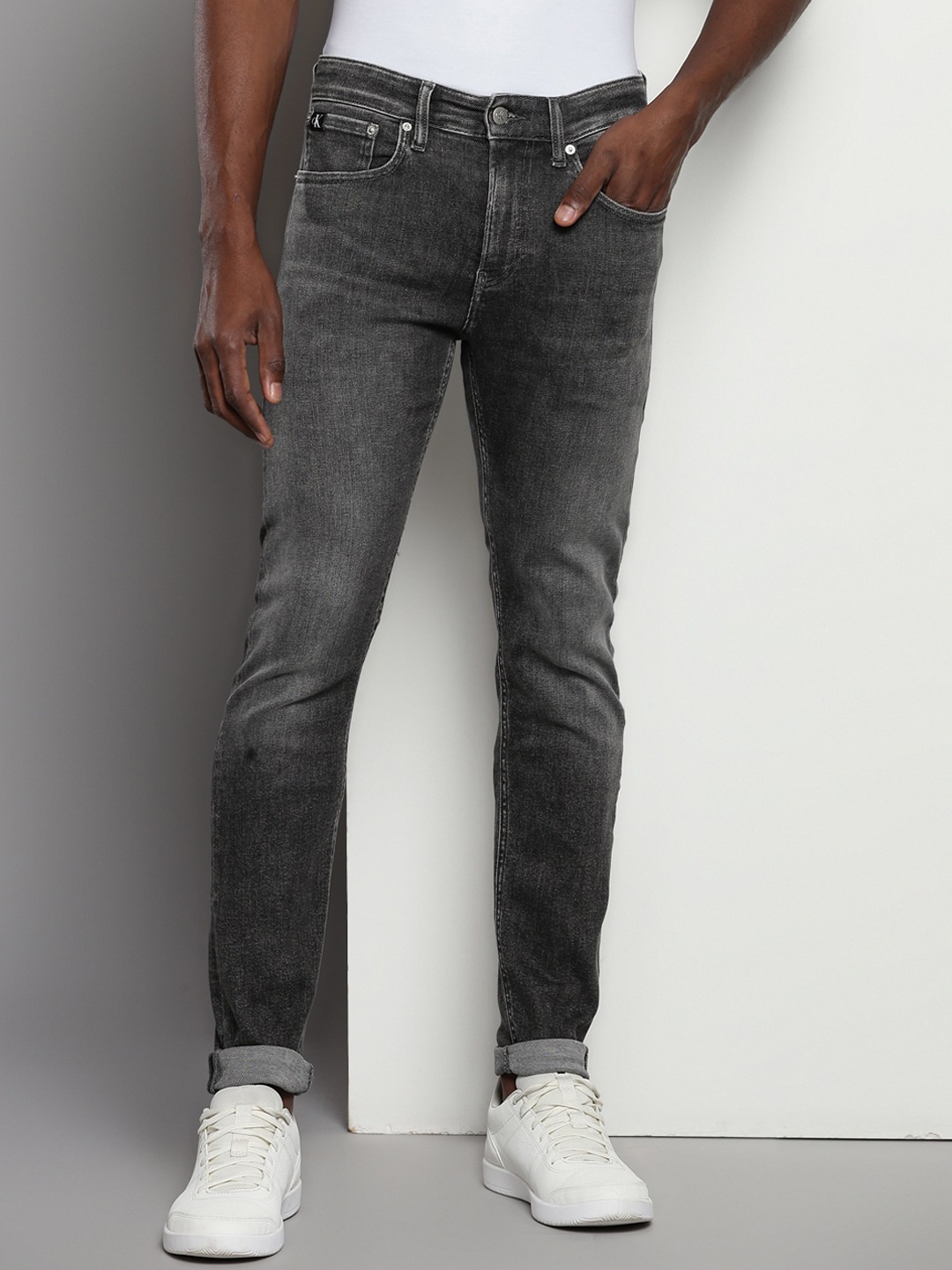 

Calvin Klein Men Mid Rise Skinny Fit Light Fade Stretchable Jeans, Grey