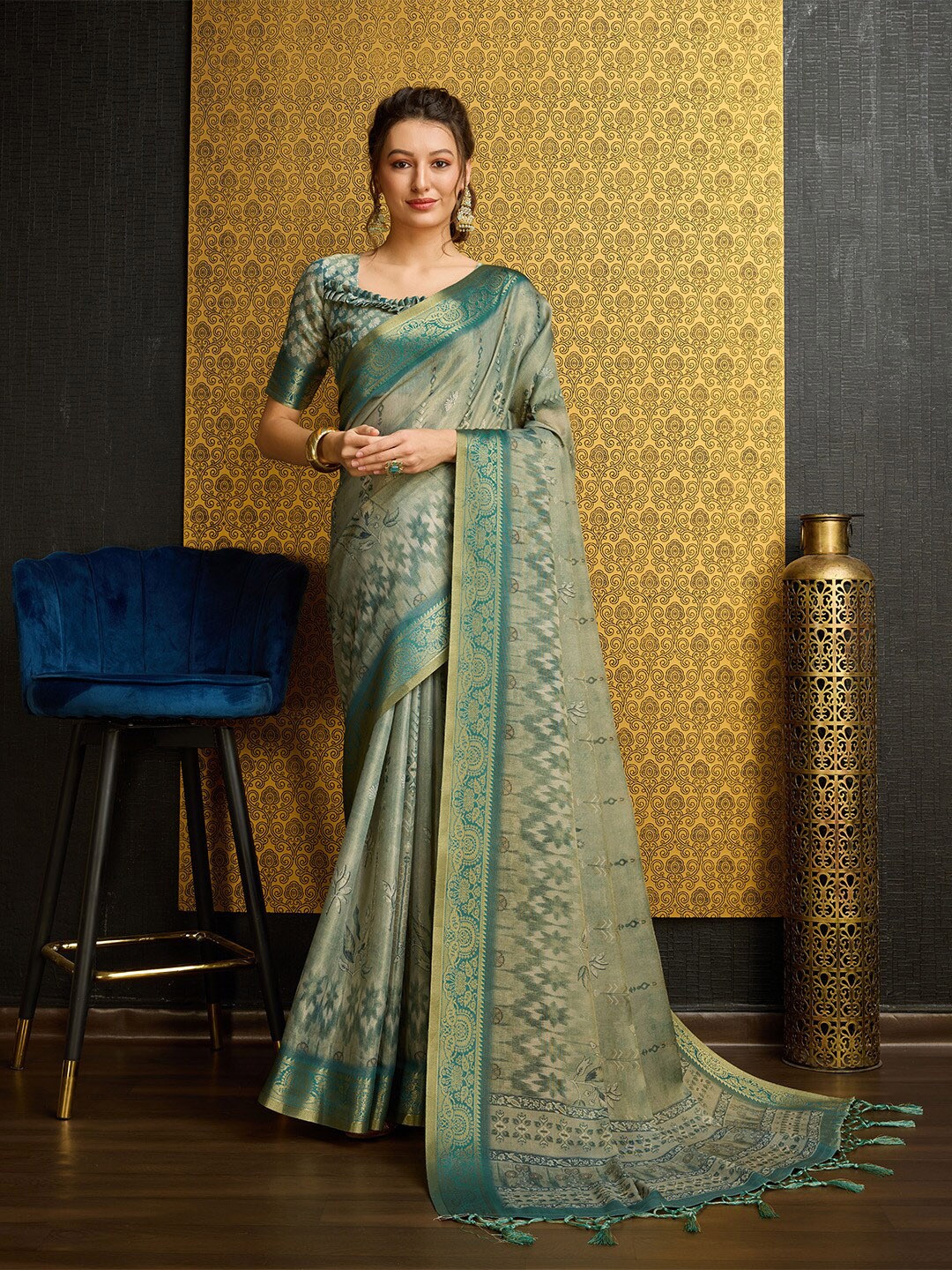 

Ishin Green Ethnic Motifs Printed Zari Saree