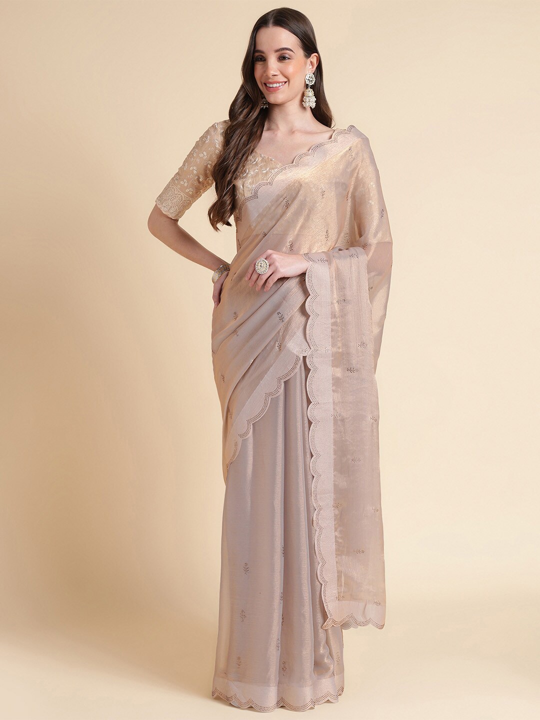 

Ishin Peach Ethnic Motifs Embellished Stones Saree