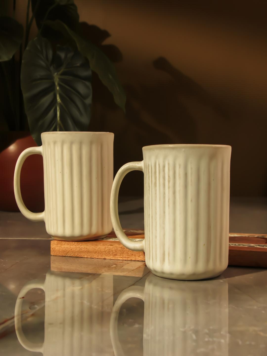 

The Decor Mart White 2 Pieces Textured Ceramic Matte Mugs 400ml Each