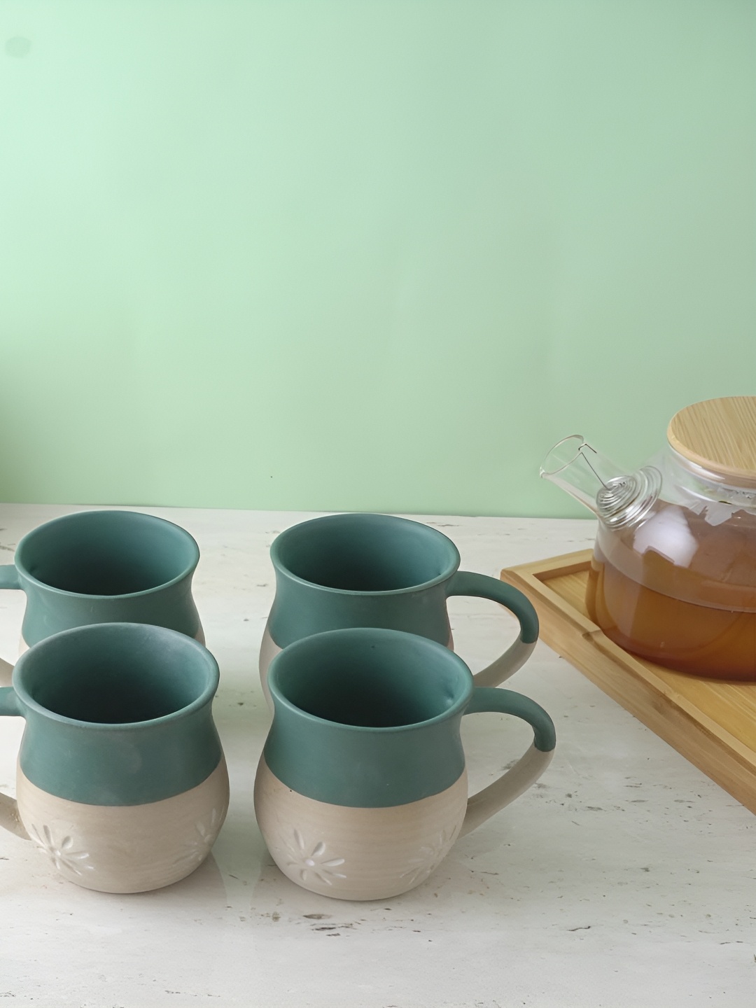 

The Decor Mart Green & Beige 4 Pieces Ethnic Motifs Printed Ceramic Matte Mugs 300ml Each