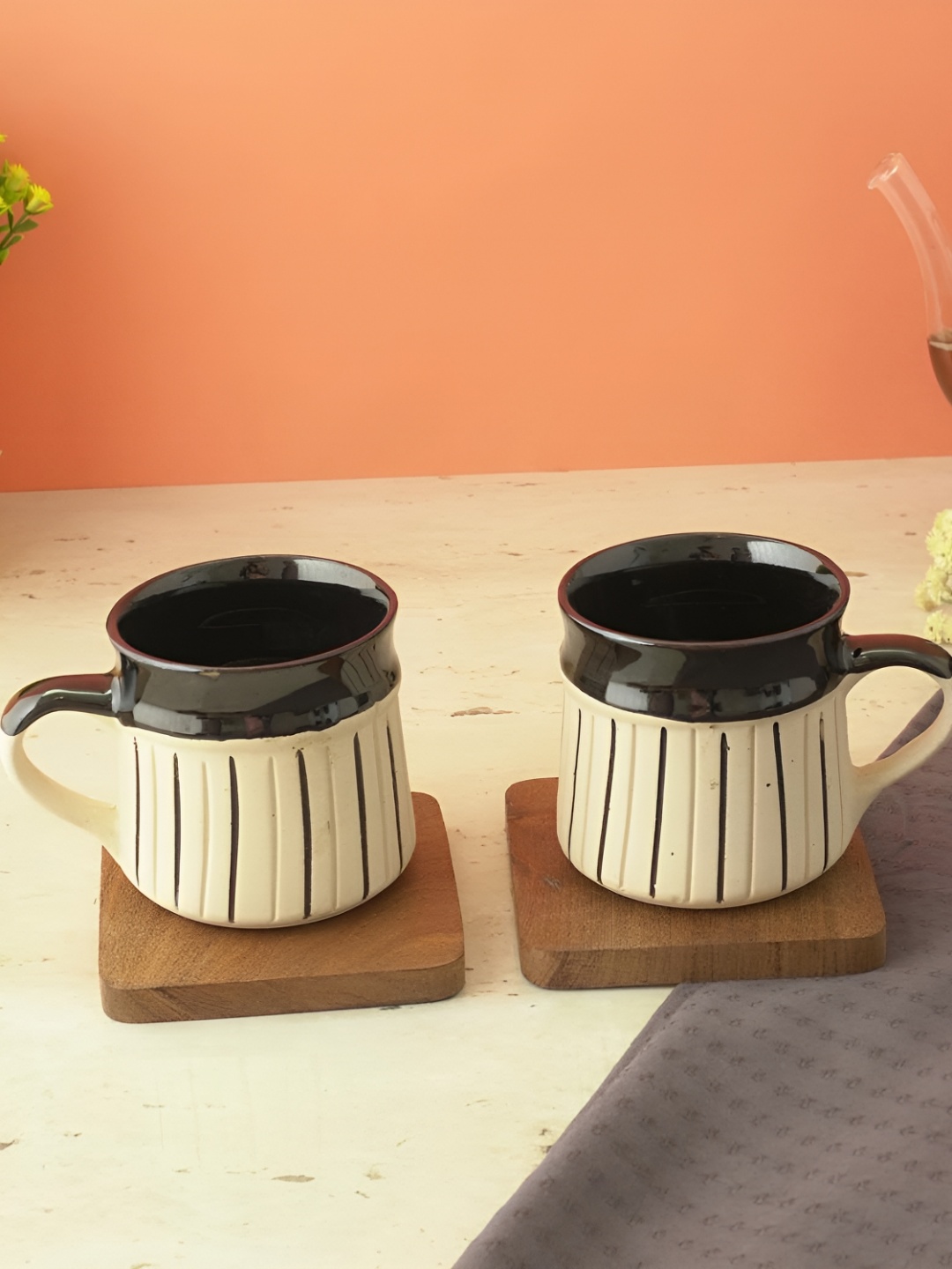 

The Decor Mart Cream & Black 2 Pieces Textured Ceramic Glossy Cups 200 ml