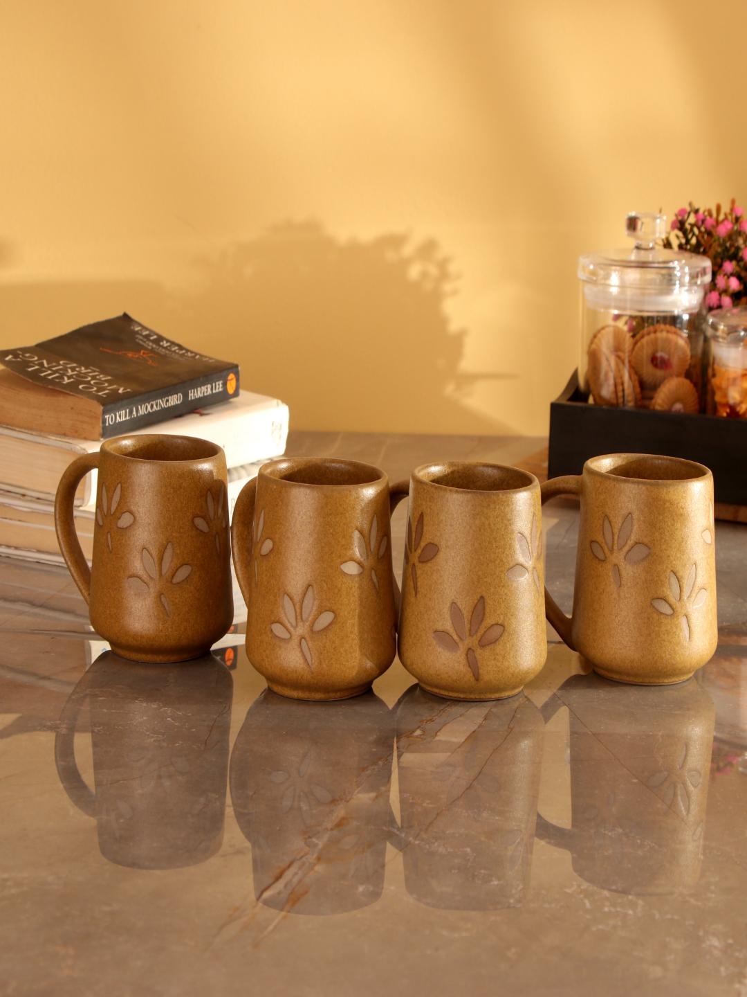 

The Decor Mart Beige 4 Pieces Printed Dishwasher Safe Ceramic Matte Mugs